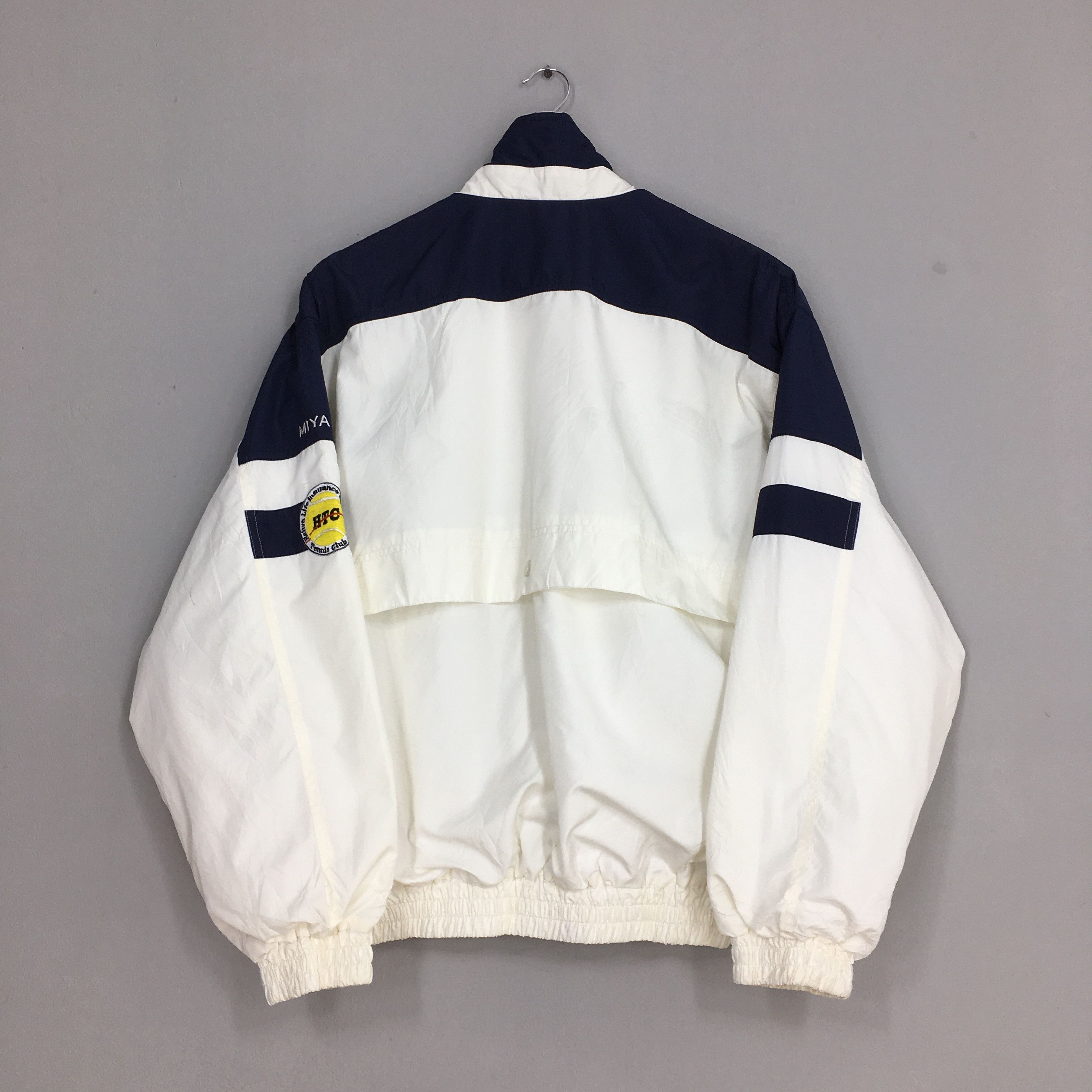 Sergio Tacchini Vintage Sergio Tacchini Windbreaker White Jacket Large Size US L / EU 52-54 / 3 - 9 Thumbnail