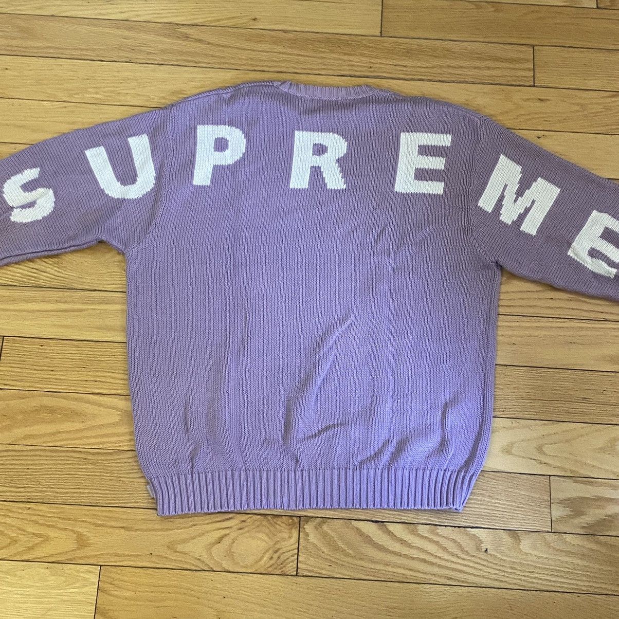 Supreme back best sale logo sweater