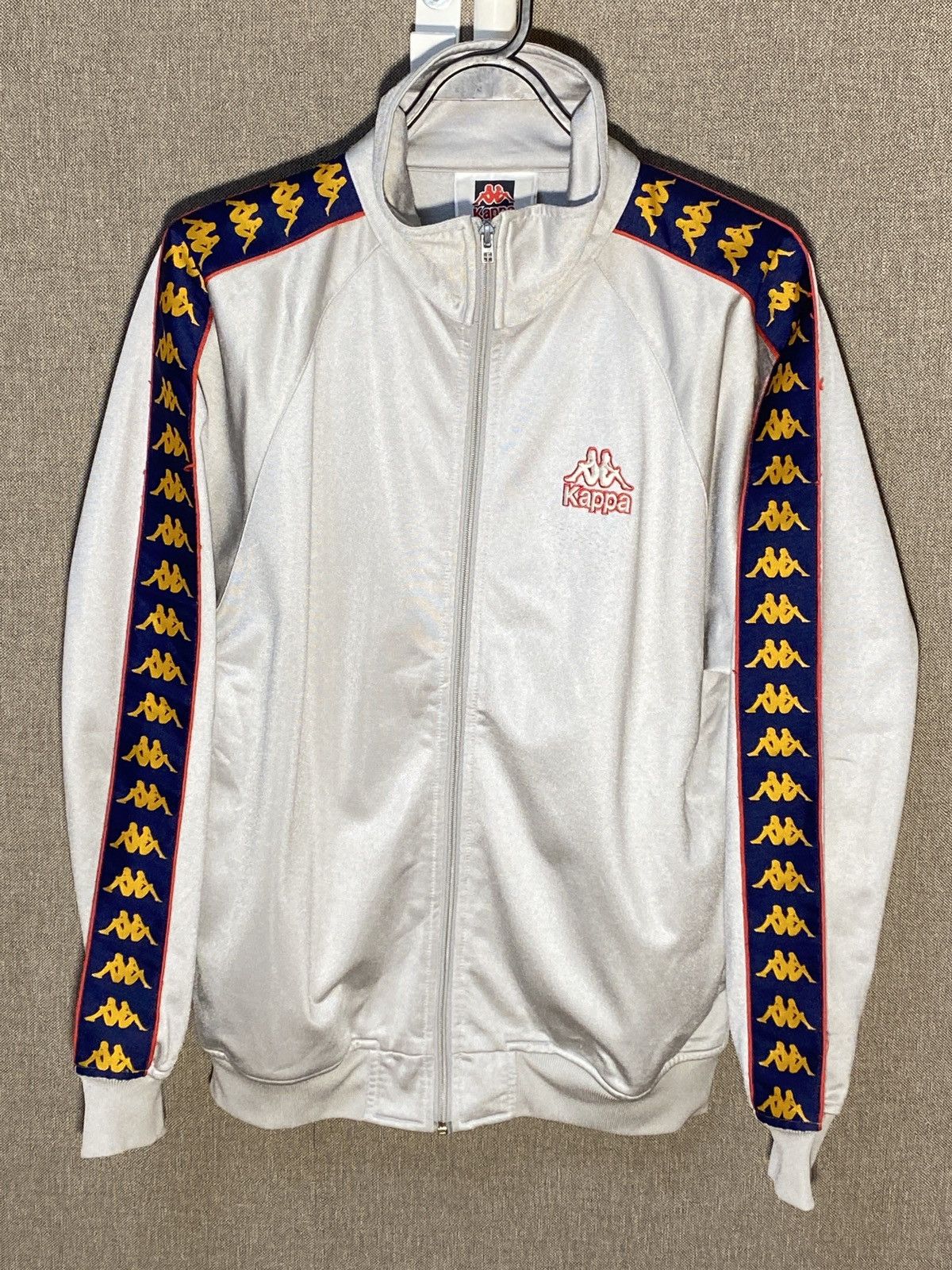 White and cheap gold kappa tracksuit