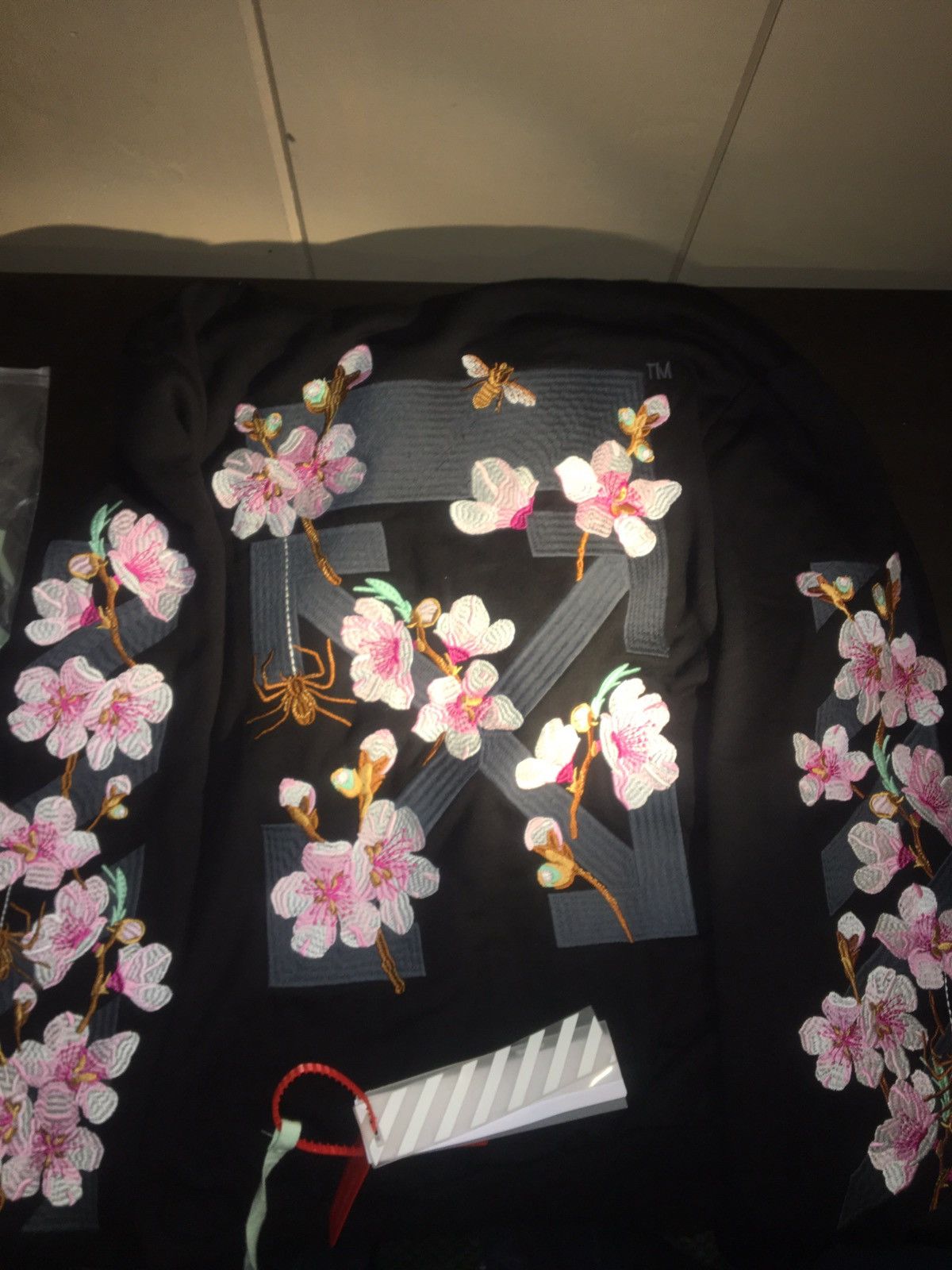Off white global warming cherry blossom 2025