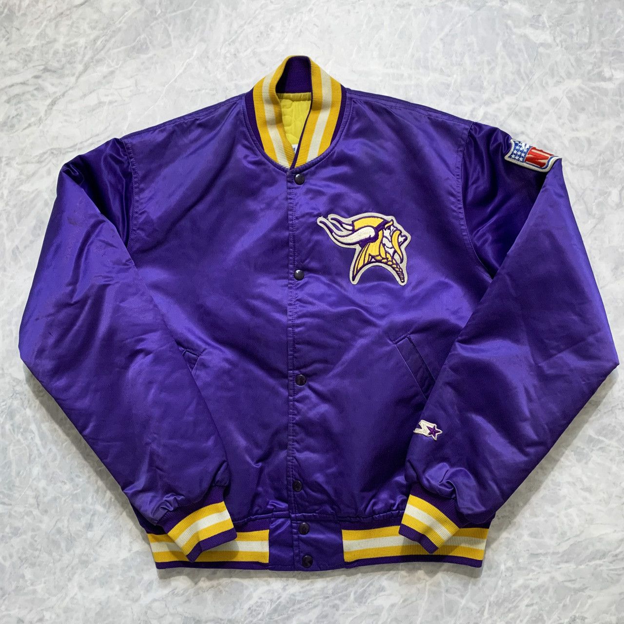 Homage x Starter Minnesota Vikings Satin Jacket from Homage. Officially Licensed NFL Apparel. Shop Pro 80's Starter, Gameday, & Bomber Jackets.