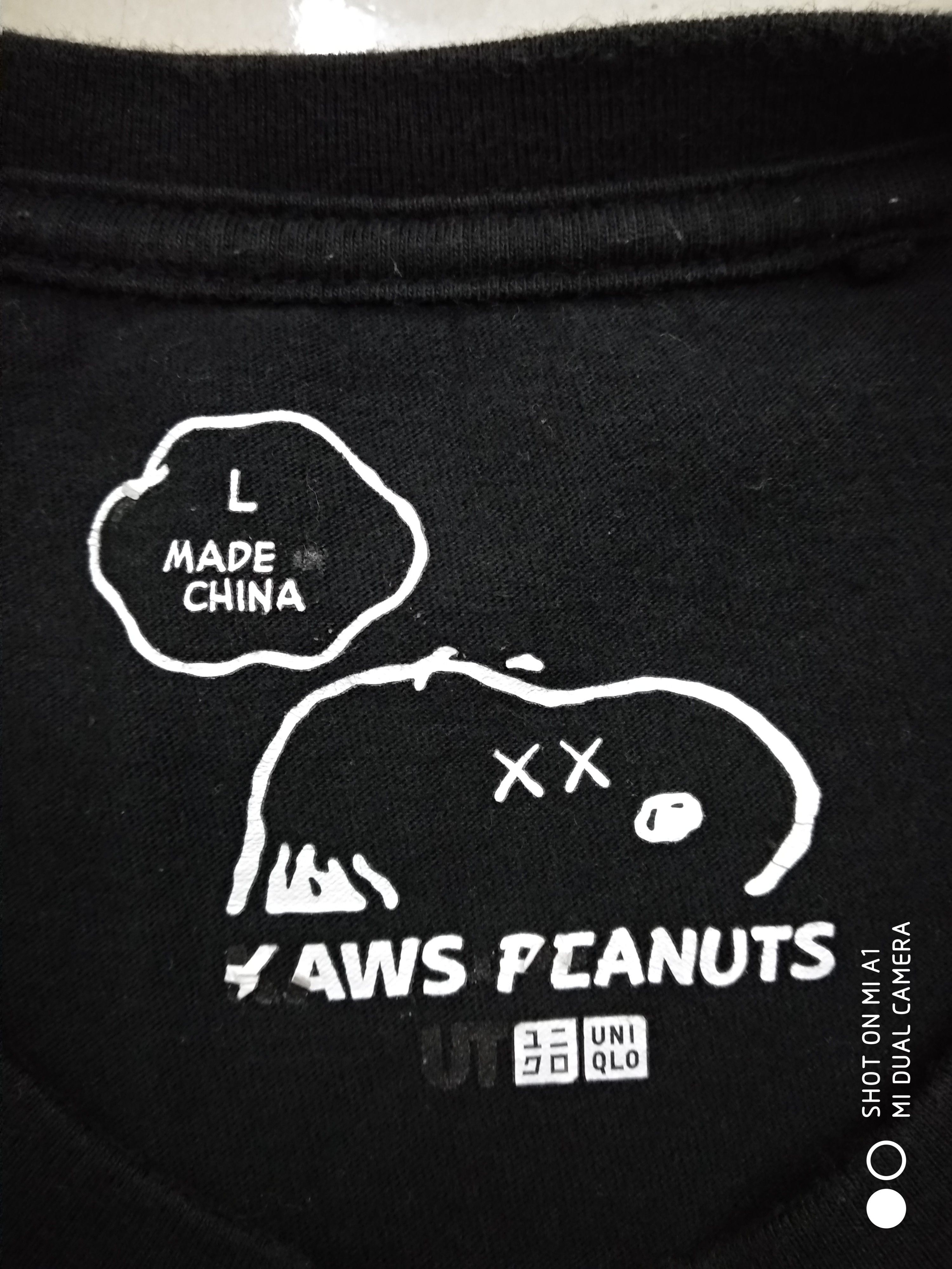 Kaws × Peanuts × Uniqlo Kaws X Peanuts X Uniqlo pocket tee Size US L / EU 52-54 / 3 - 6 Thumbnail