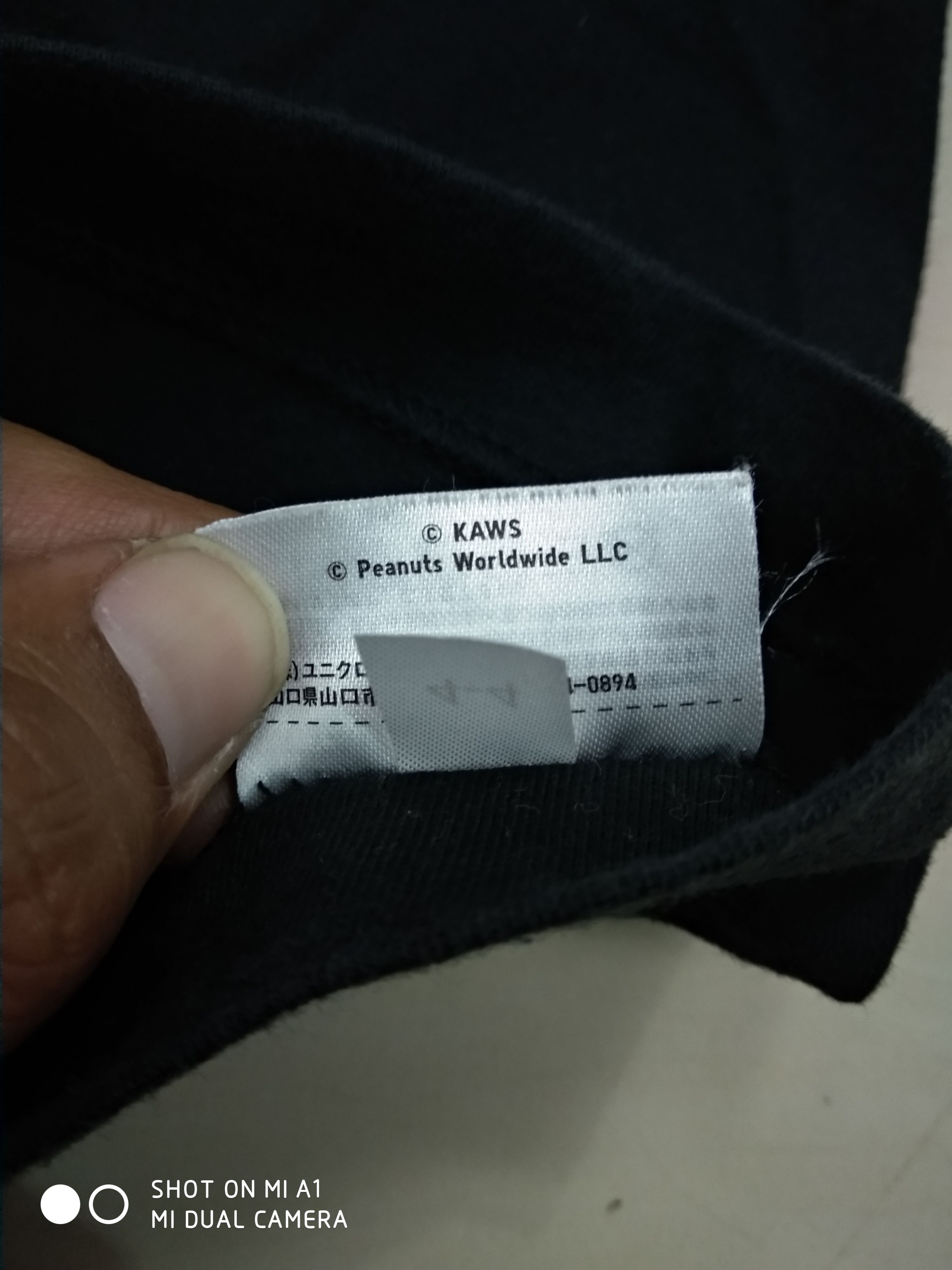 Kaws × Peanuts × Uniqlo Kaws X Peanuts X Uniqlo pocket tee Size US L / EU 52-54 / 3 - 5 Thumbnail