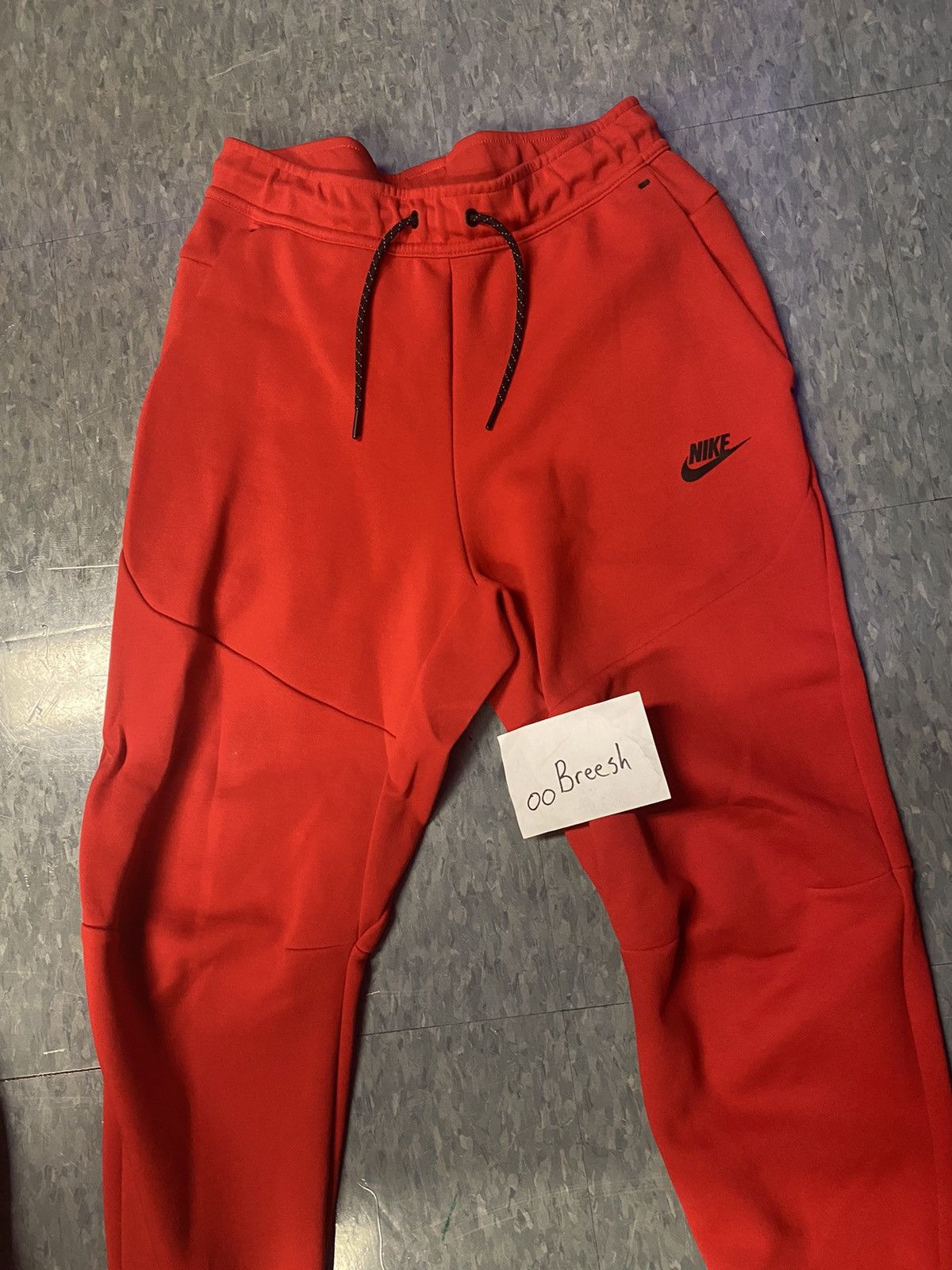 red nike tech pants