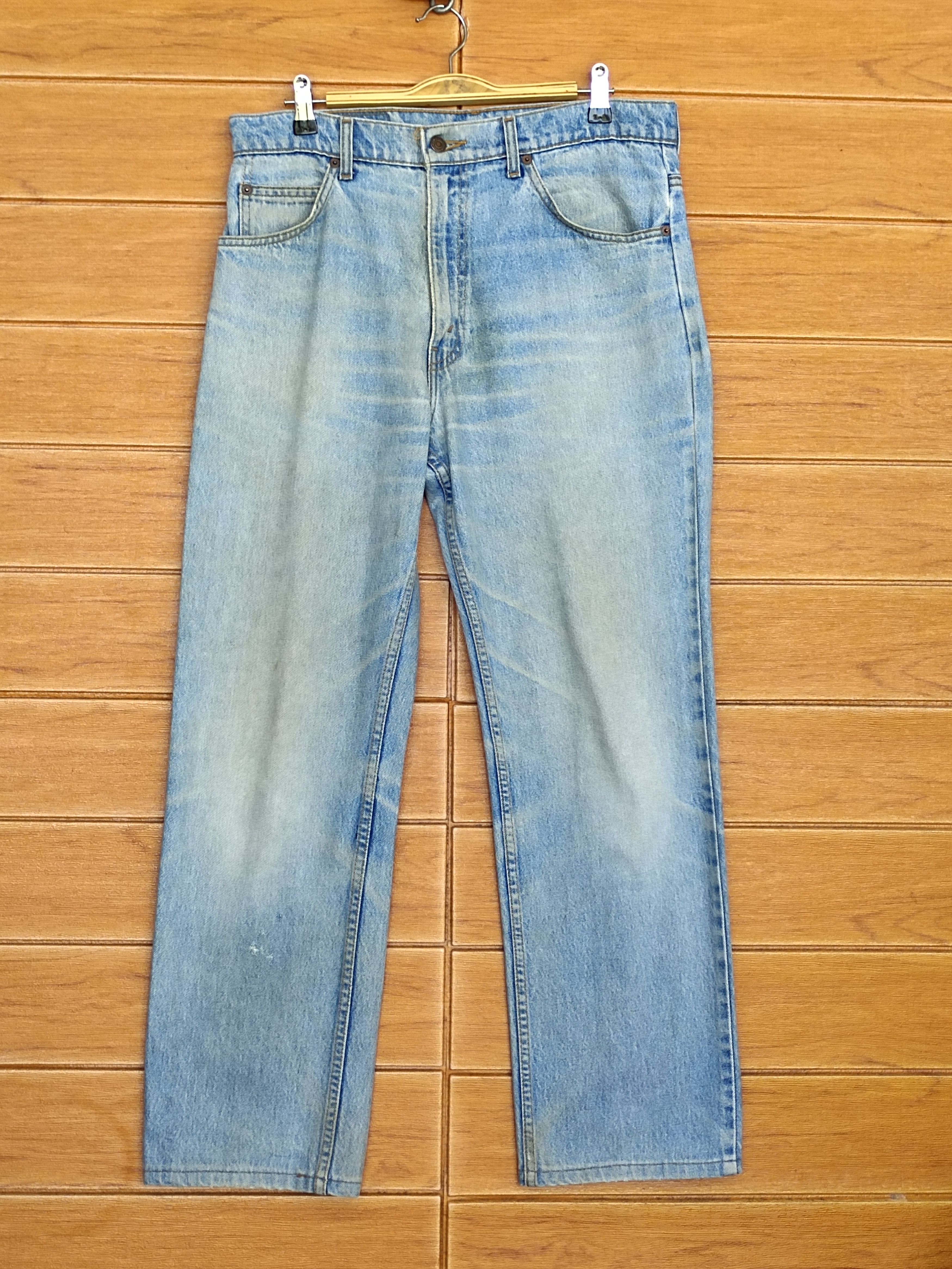 Vintage Levi's 607 Dirty Light Wash Denim Jeans Orange Tag