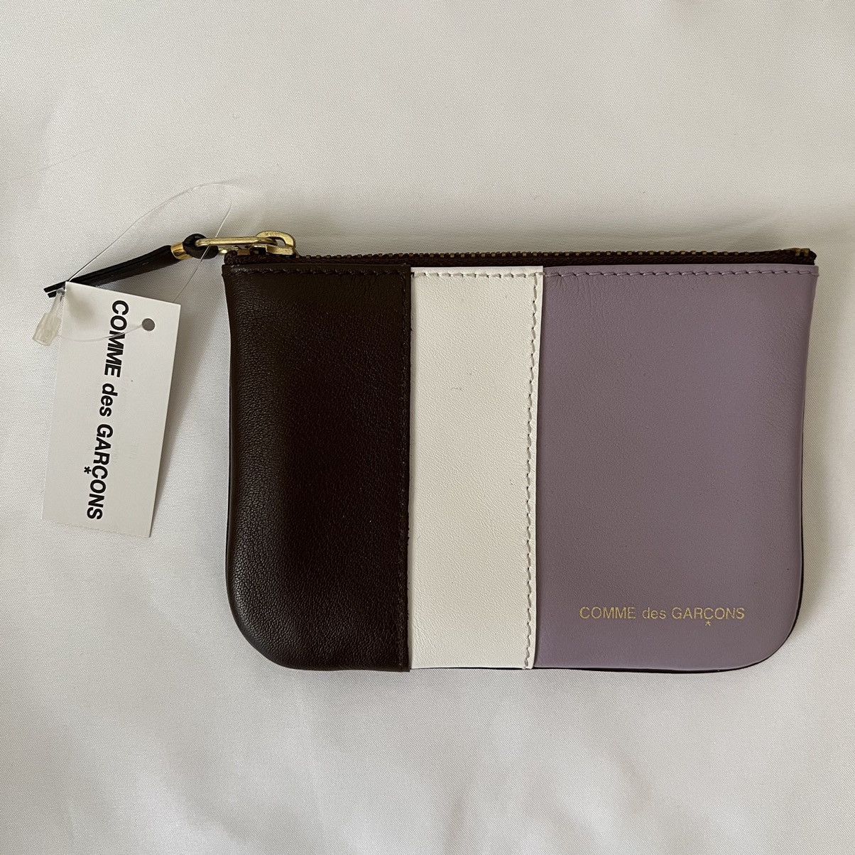 Limited patchwork zip wallet