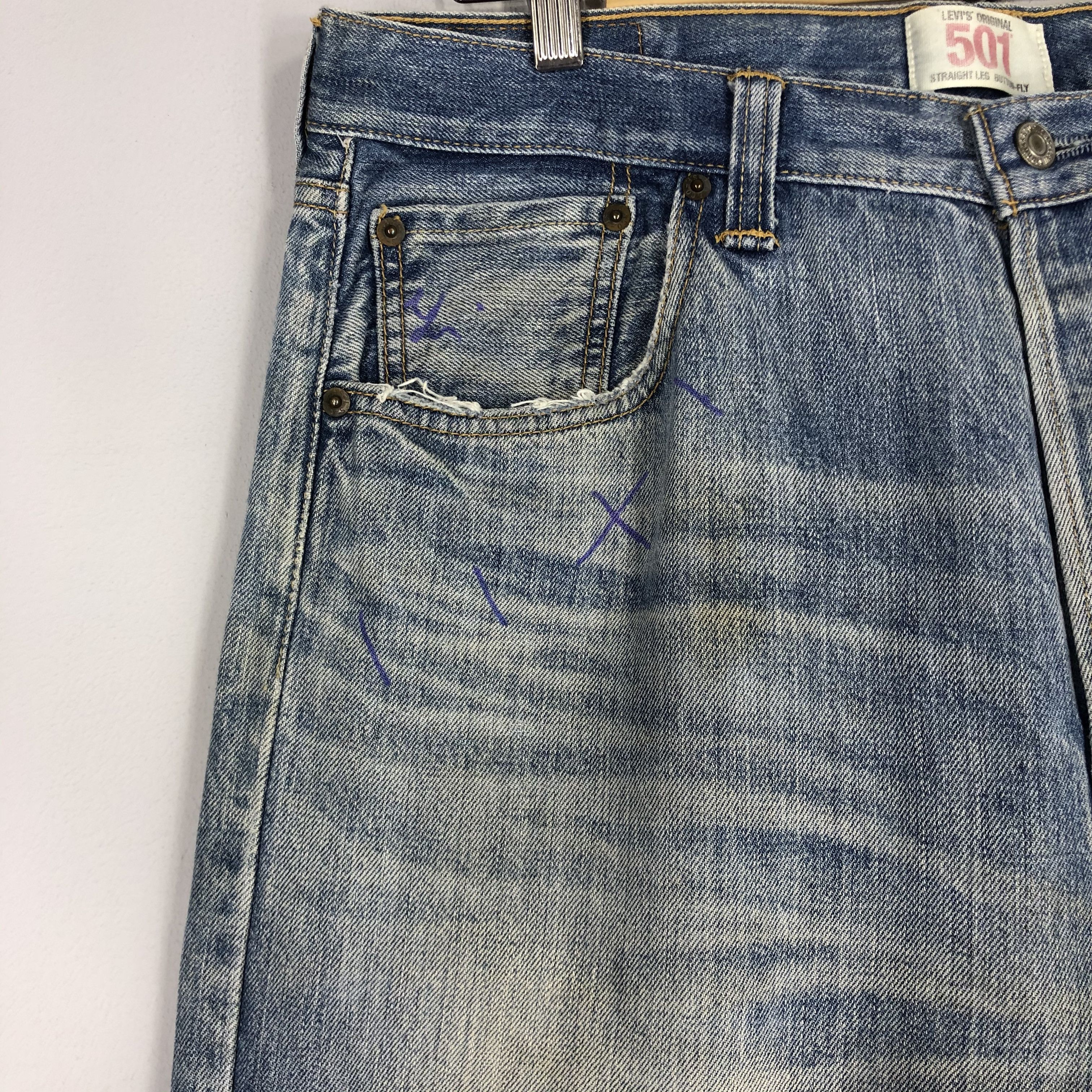 Distressed Levi's 501 Light Blue Jean Ripped Jean Size 36