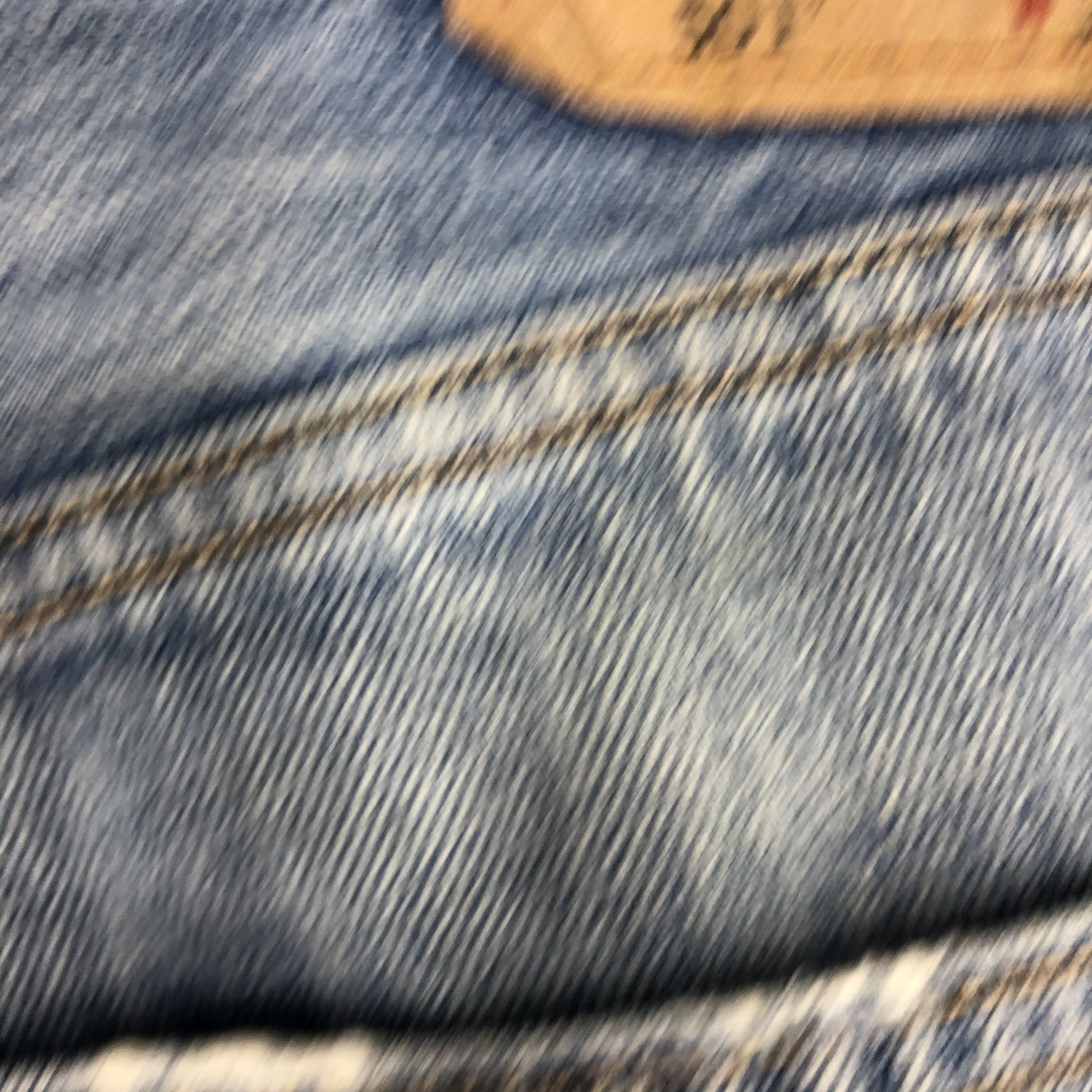 Distressed Levi's 501 Light Blue Jean Ripped Jean Size 36