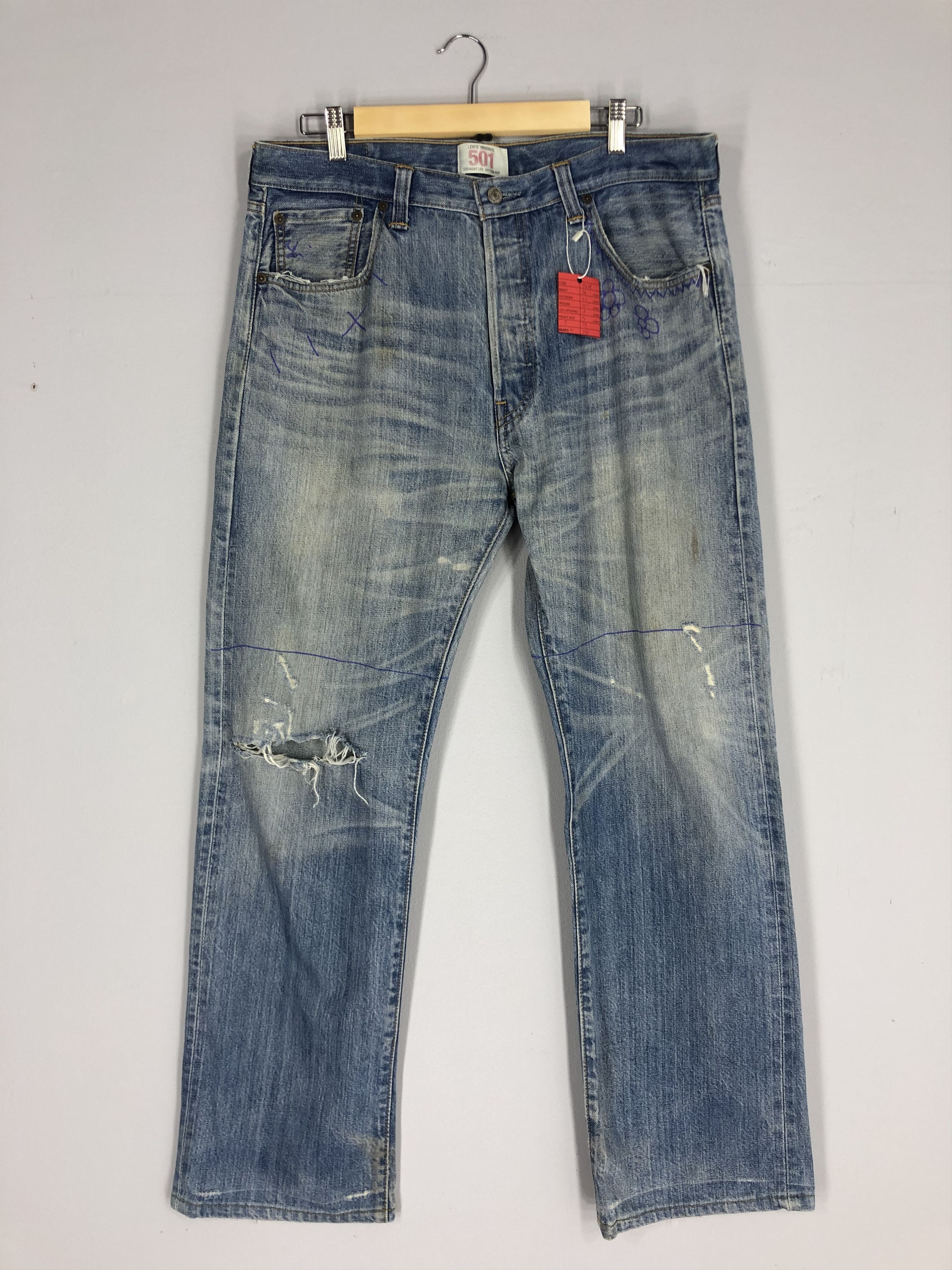 Distressed Levi's 501 Light Blue Jean Ripped Jean Size 36