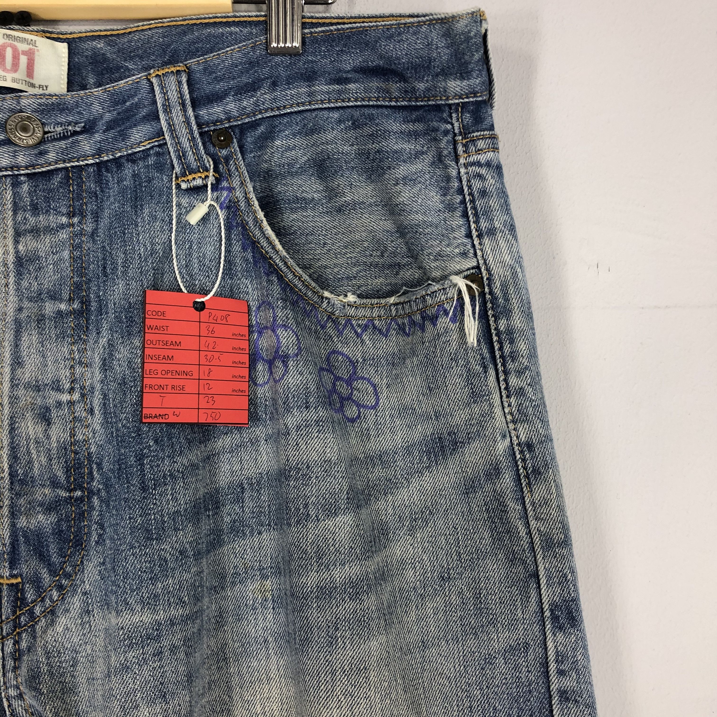 Distressed Levi's 501 Light Blue Jean Ripped Jean Size 36