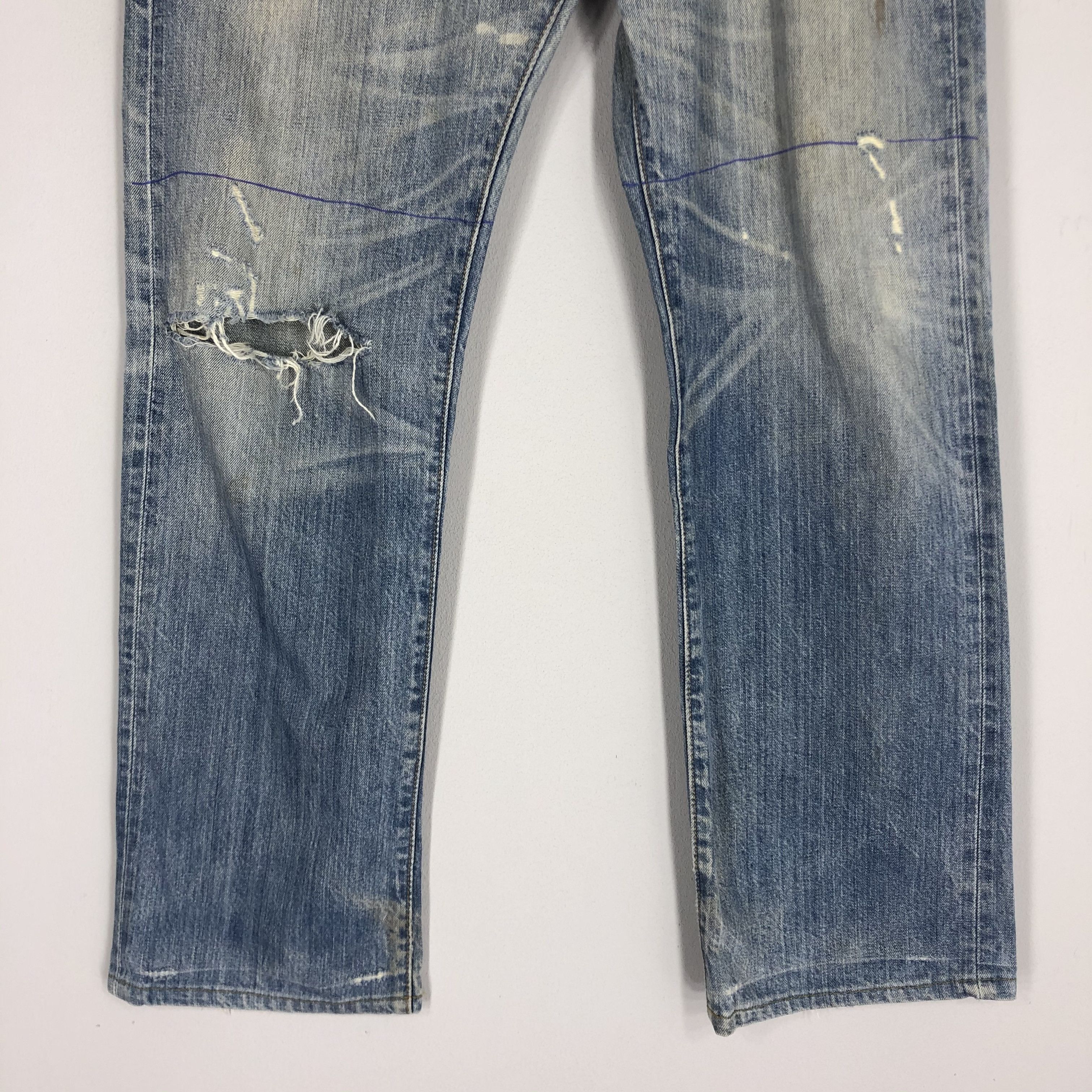Distressed Levi's 501 Light Blue Jean Ripped Jean Size 36