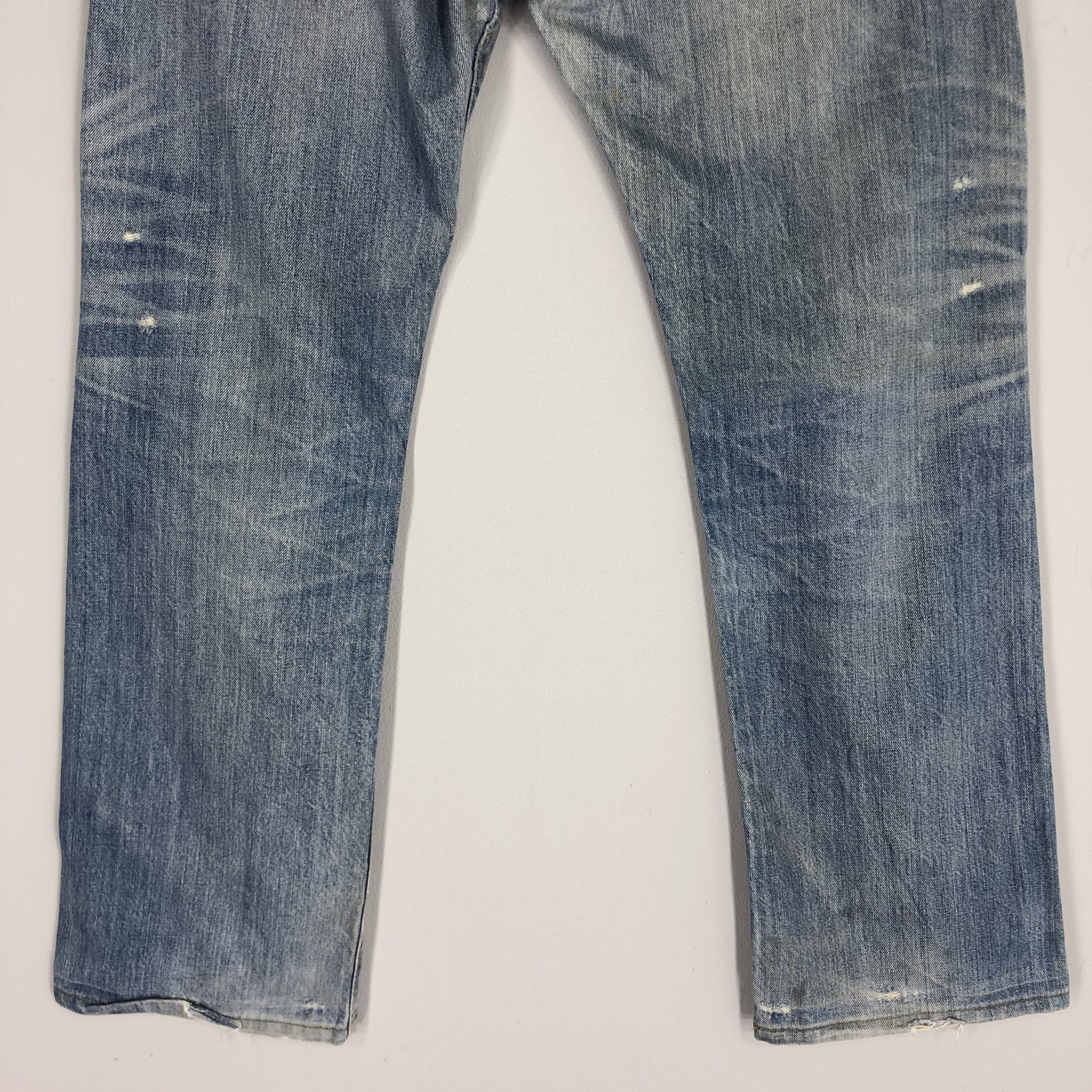 Distressed Levi's 501 Light Blue Jean Ripped Jean Size 36
