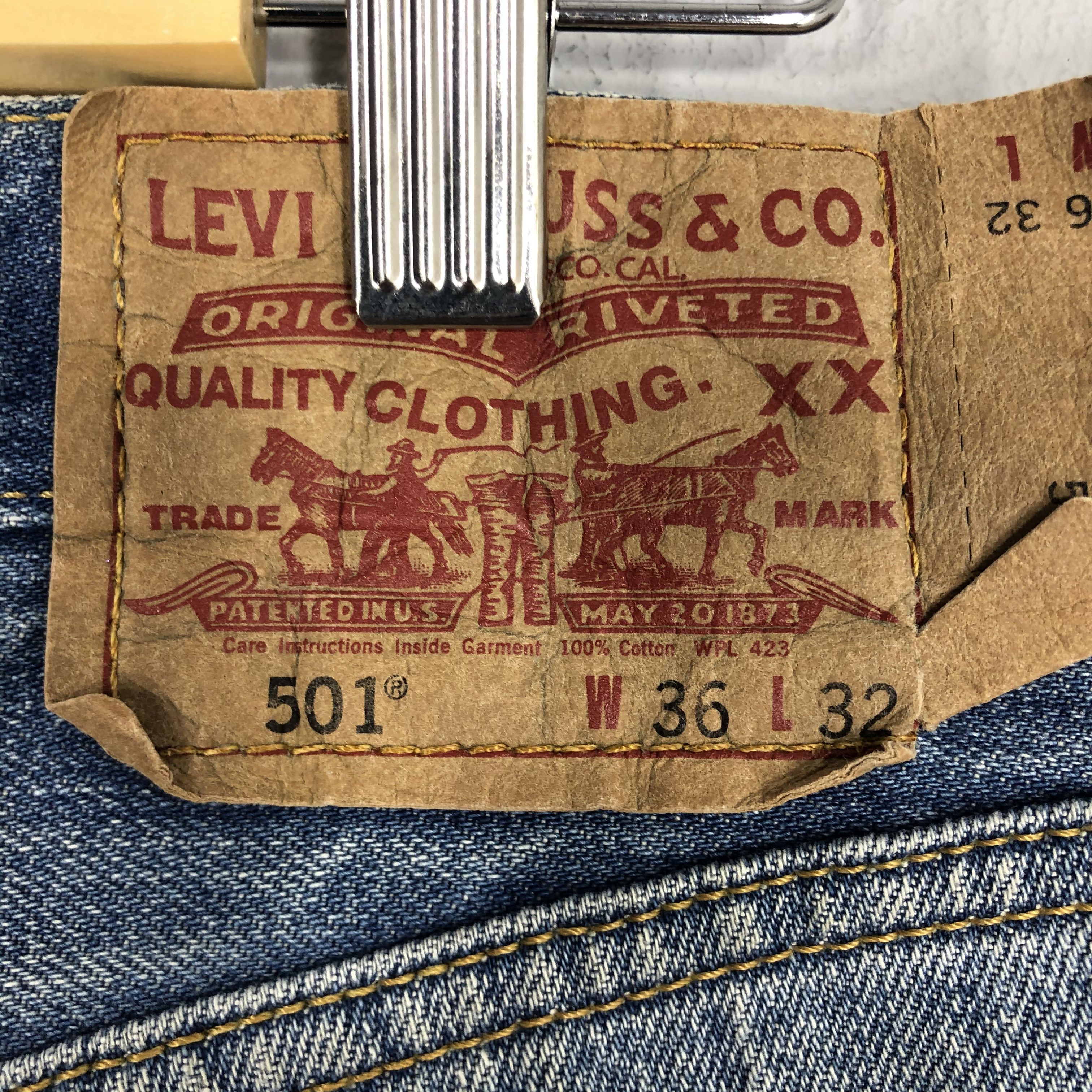 Distressed Levi's 501 Light Blue Jean Ripped Jean Size 36