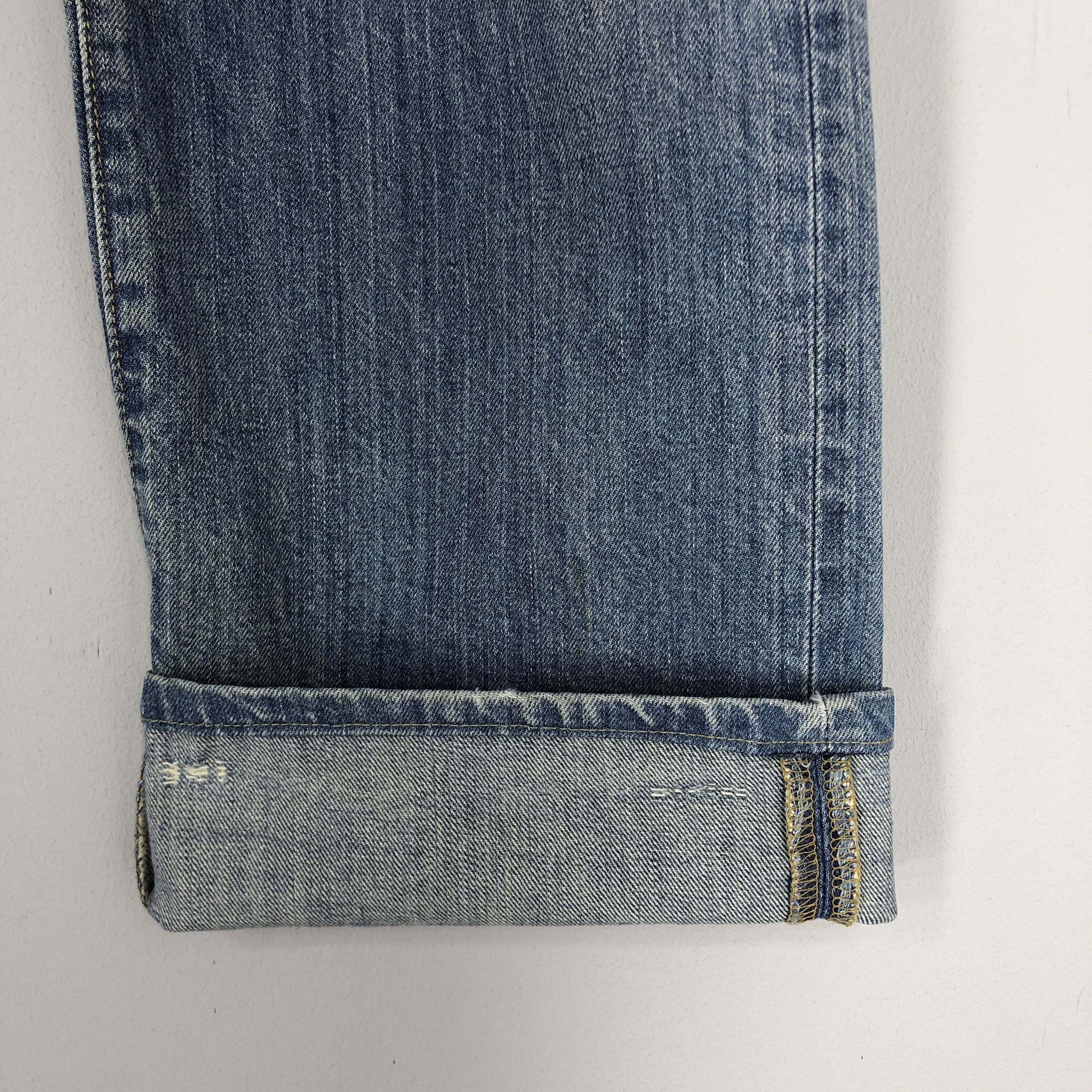 Distressed Levi's 501 Light Blue Jean Ripped Jean Size 36