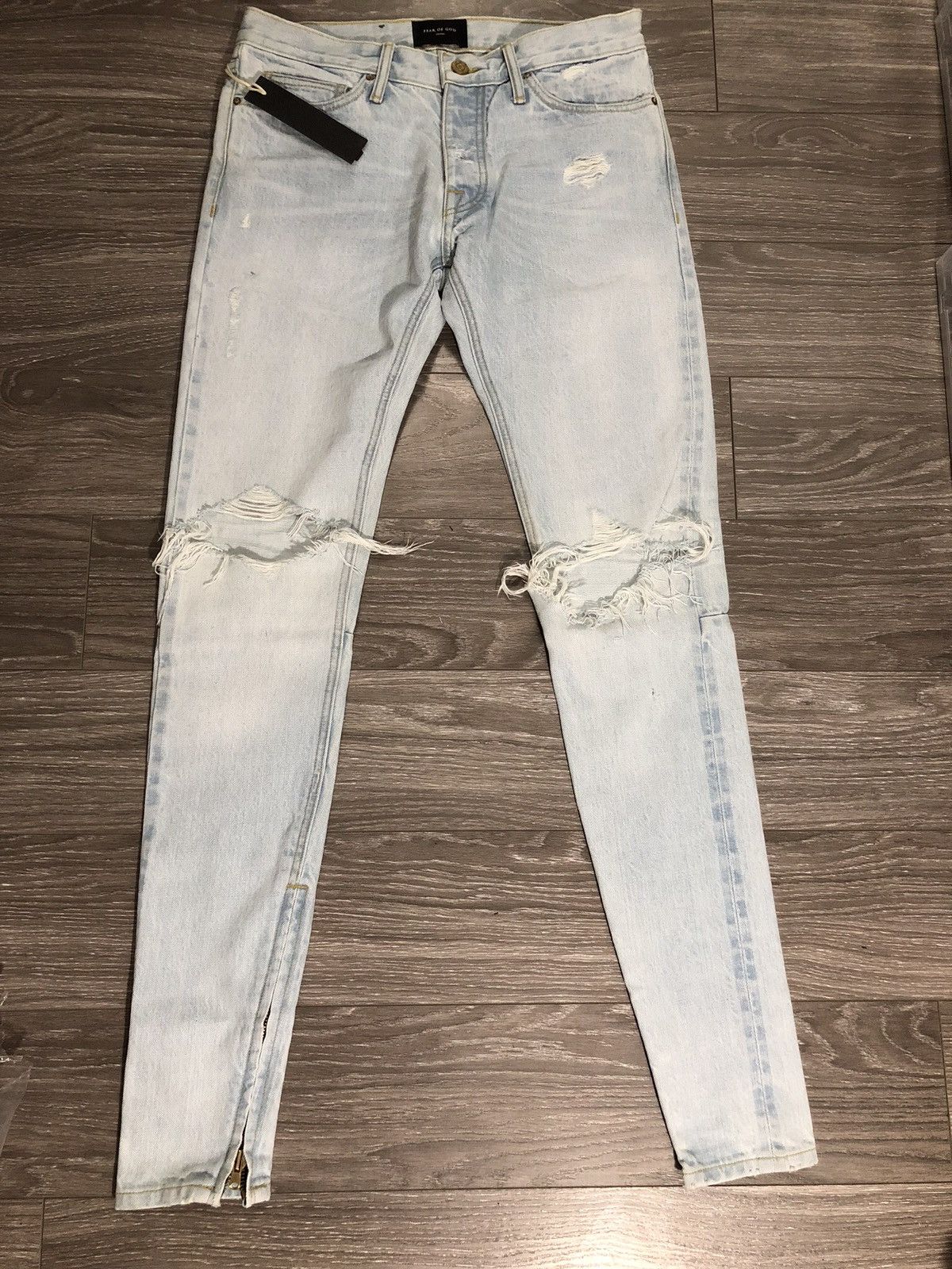 image of Fear Of God 5Th Collection Bleach Wash Distressed Denim in Light Blue, Men's (Size 31)