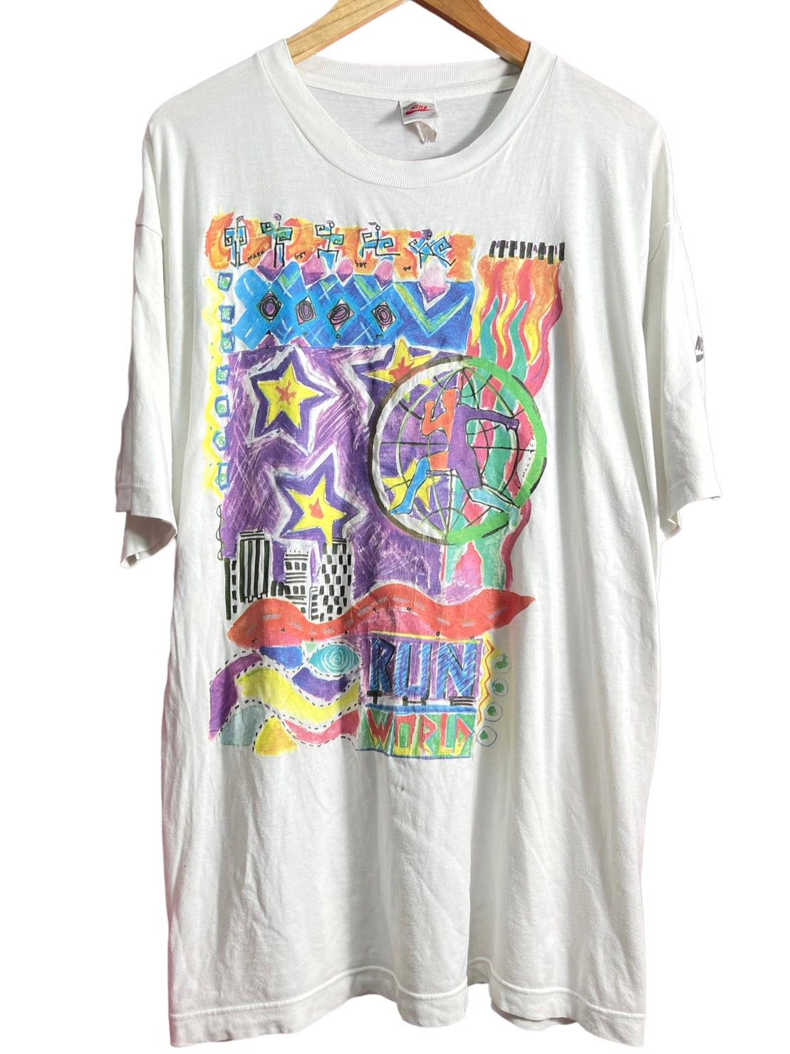 nike-vintage-90s-nike-swoosh-original-nike-graphic-t-shirt-grailed