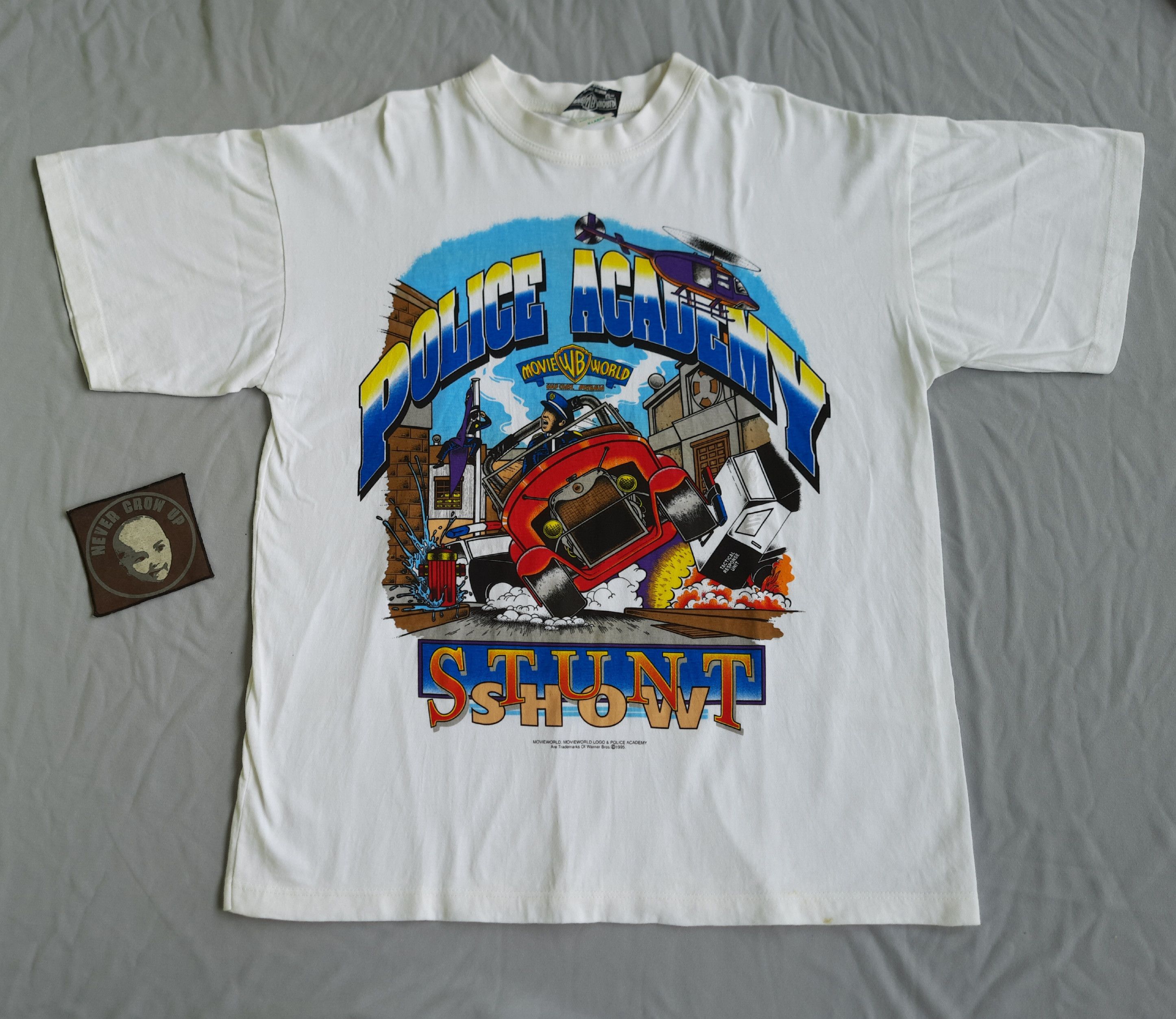 Warner Bros Vintage POLICE ACADEMY STUNT SHOW T-Shirt Size US XL / EU 56 / 4 - 1 Thumbnail