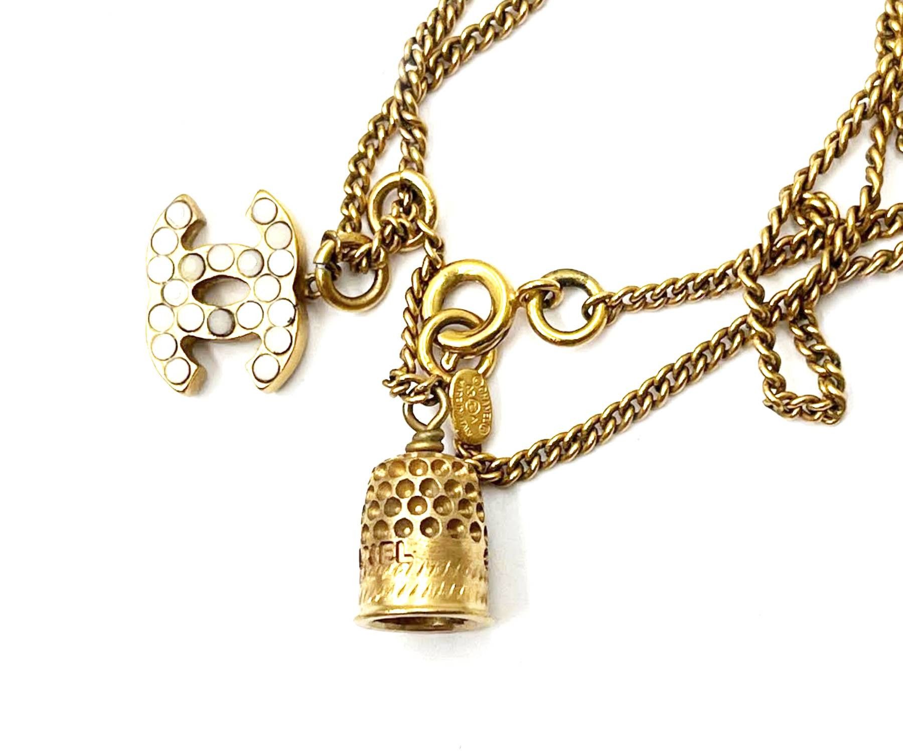 Chanel Gold Tone Bell & CC Charm Pendant