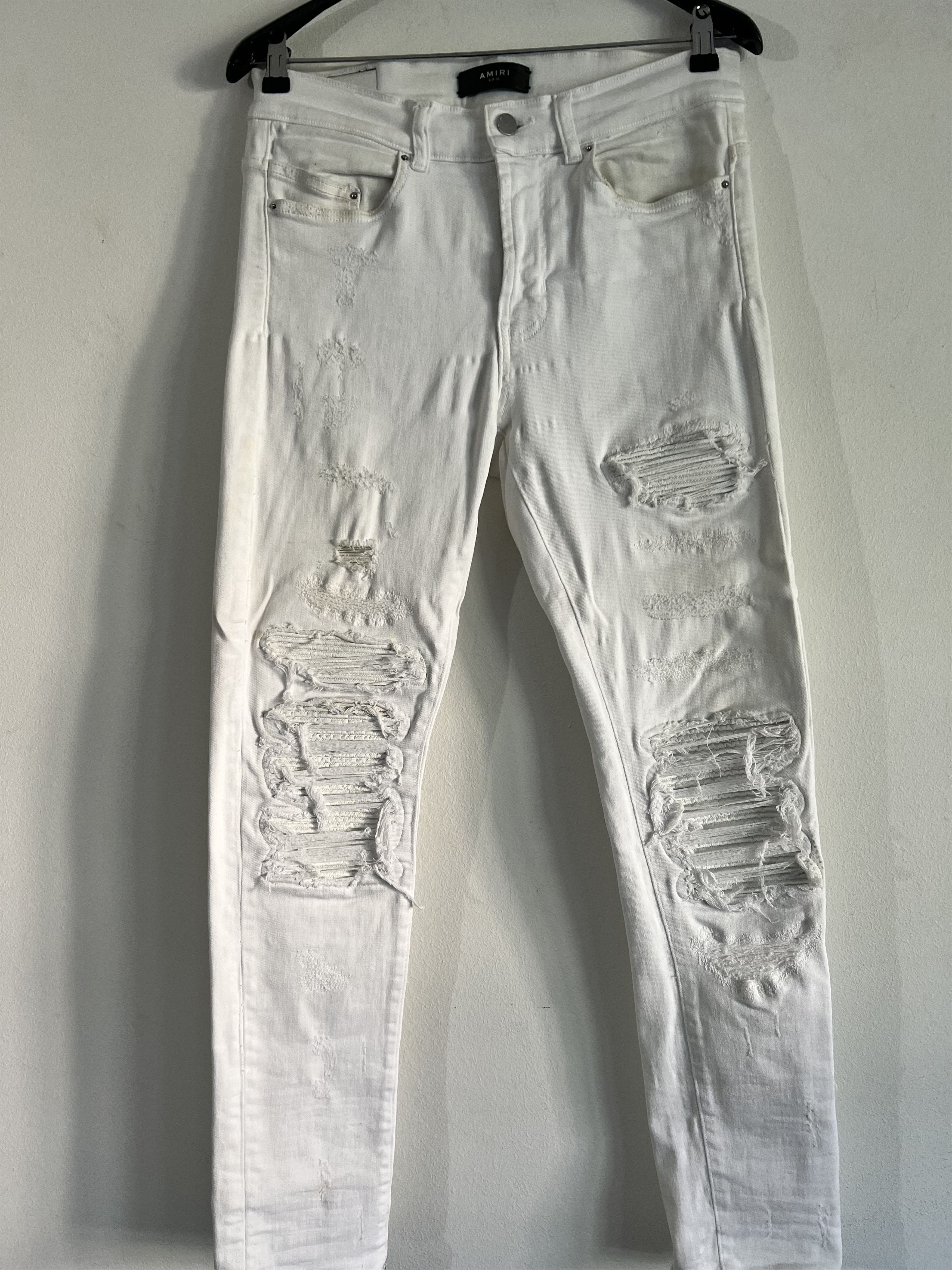 Amiri distressed denim leather patch