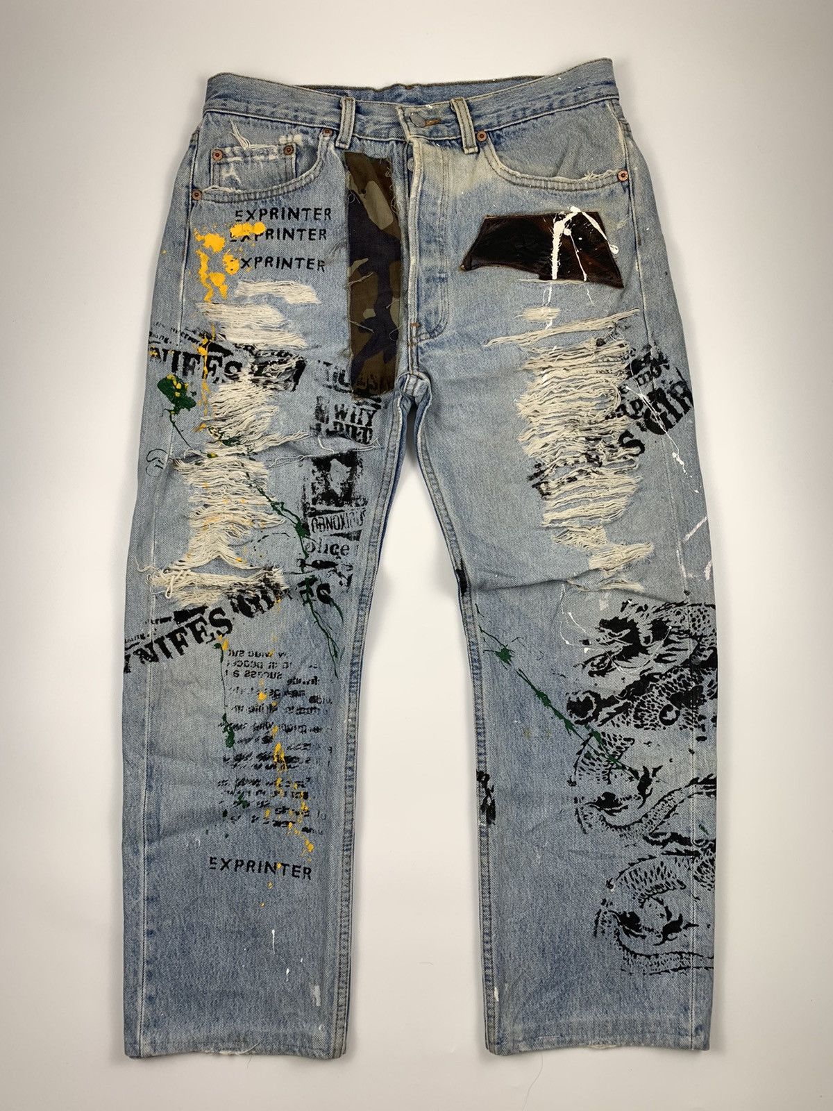 image of Distressed Denim x Levis Vintage 90's Levis 501 Distressed & Statement Denim Jeans in Light Blue (S