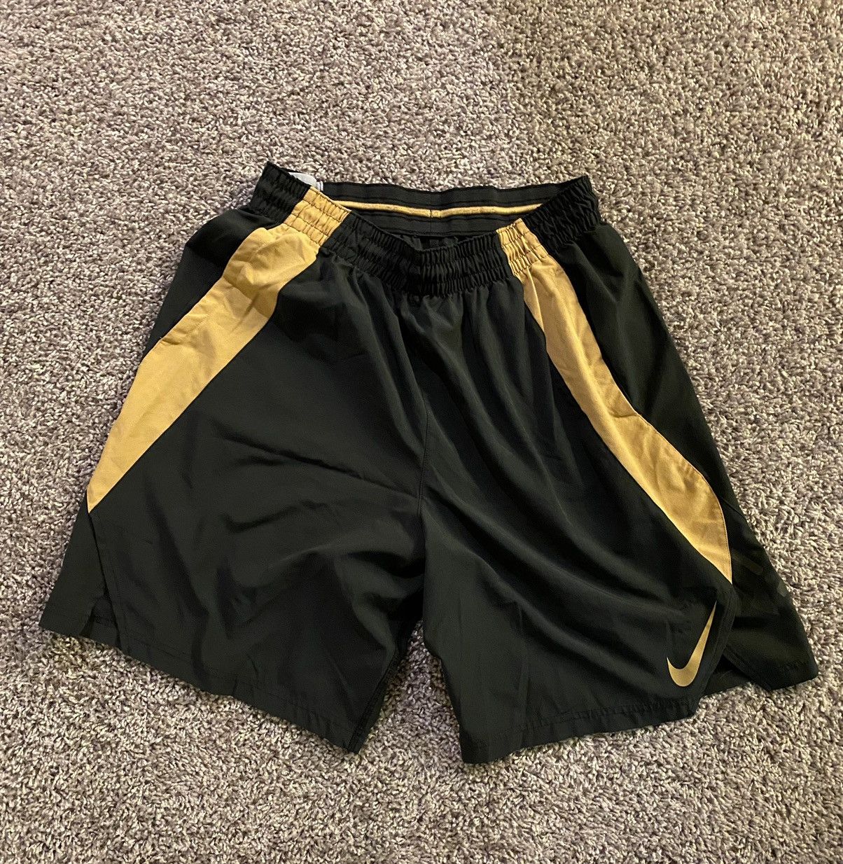 nike shorts black and gold