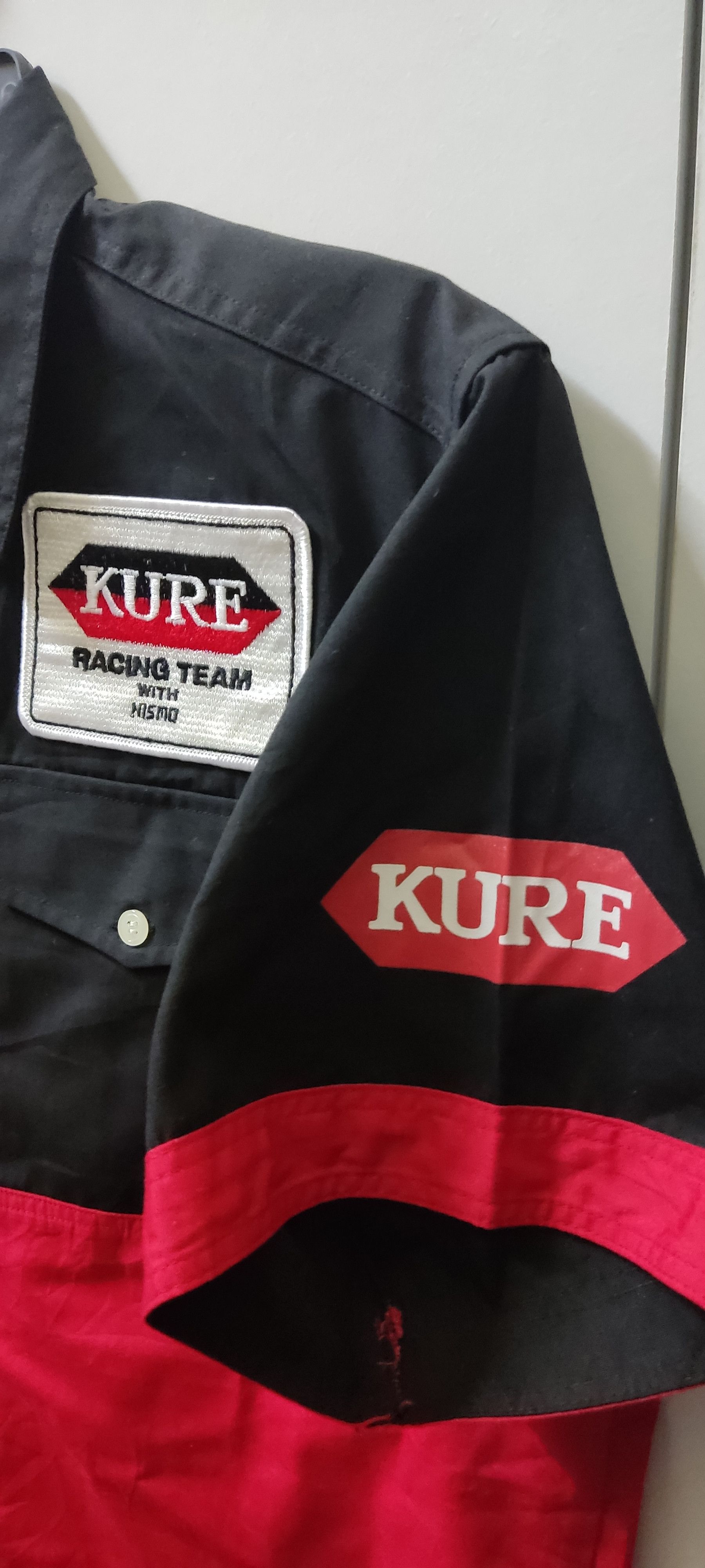 Japanese Brand KURE RACING TEAM NISMO JGTC 1996 Size US M / EU 48-50 / 2 - 4 Thumbnail