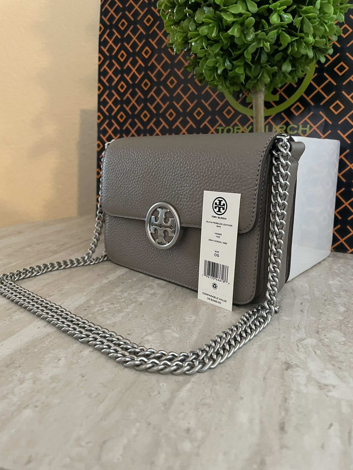 Tory Burch Olivia pebbled leather bag in gray deals heron color