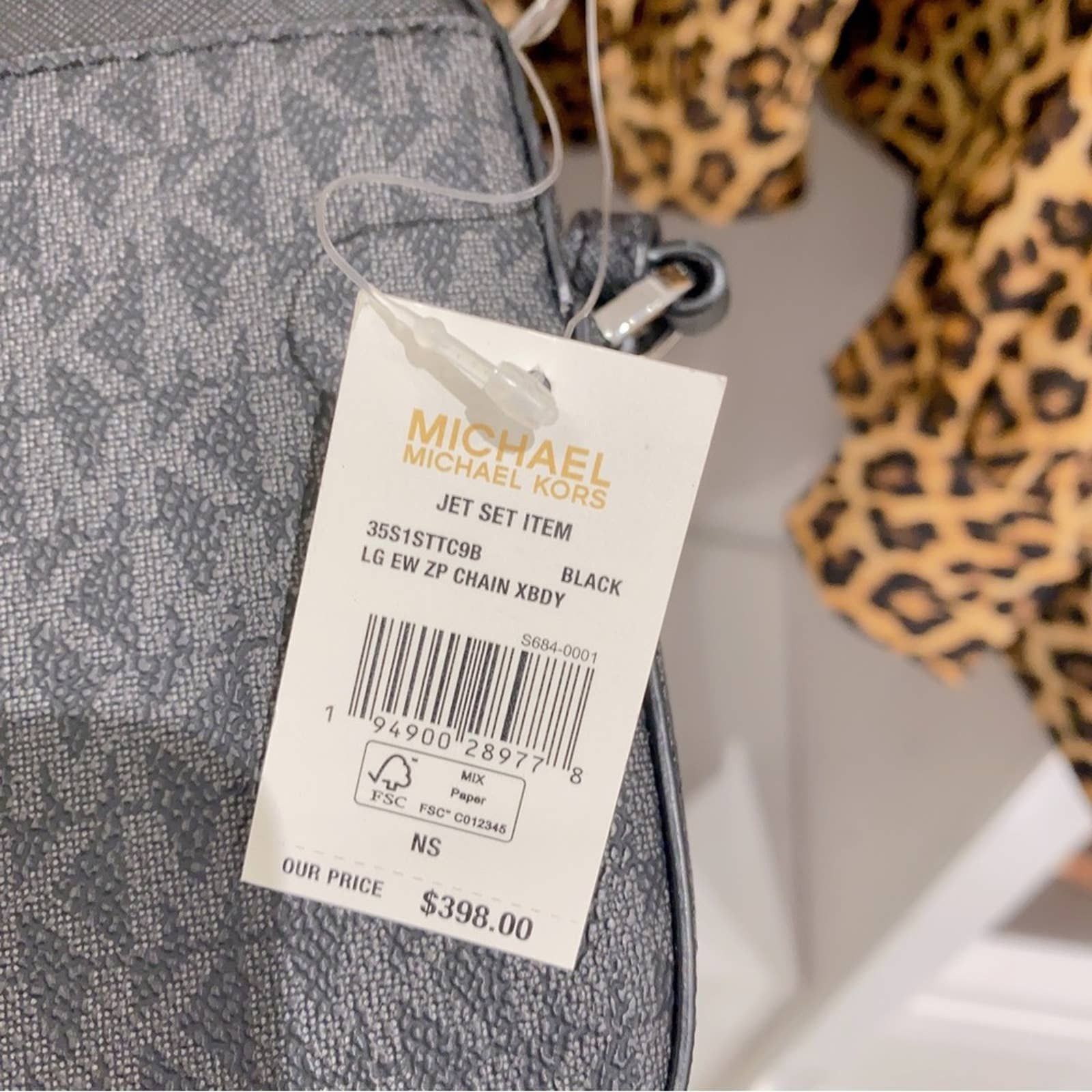 Michael Kors Jet Set Zip Crossbody in black signature