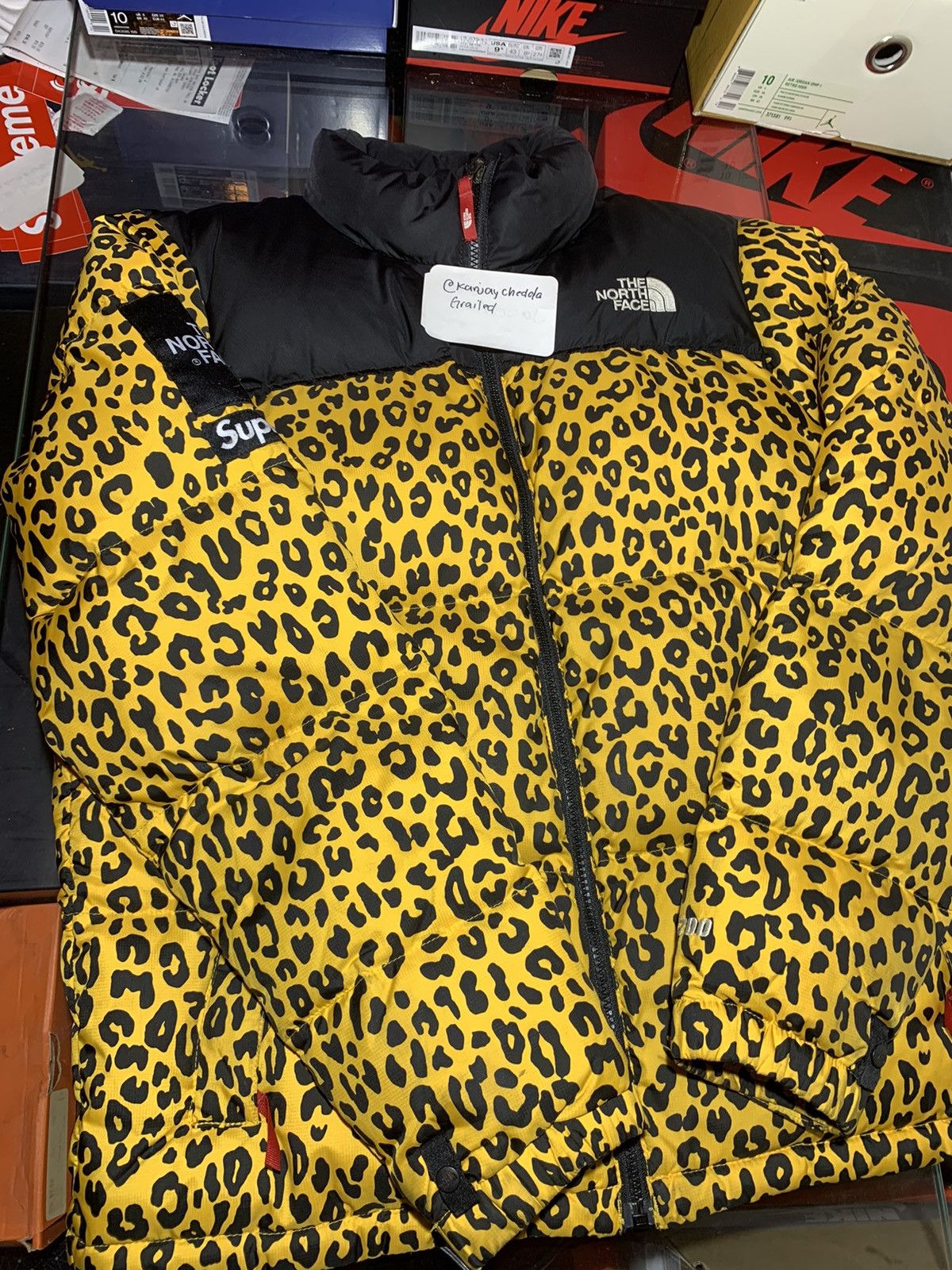 Supreme x the outlet north face leopard nuptse