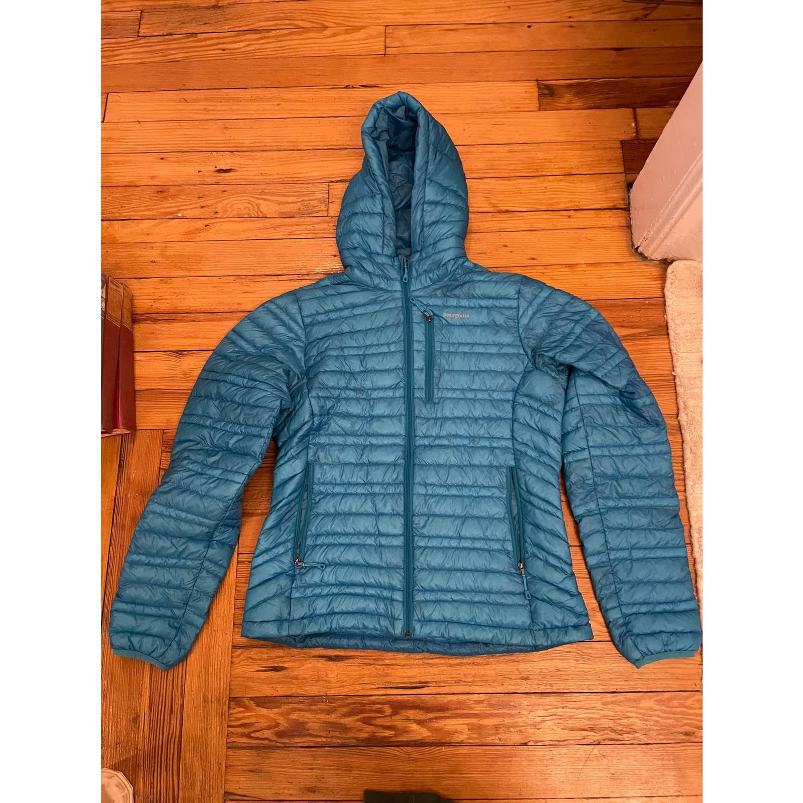 Patagonia Patagonia light blue down hoody jacket S Grailed