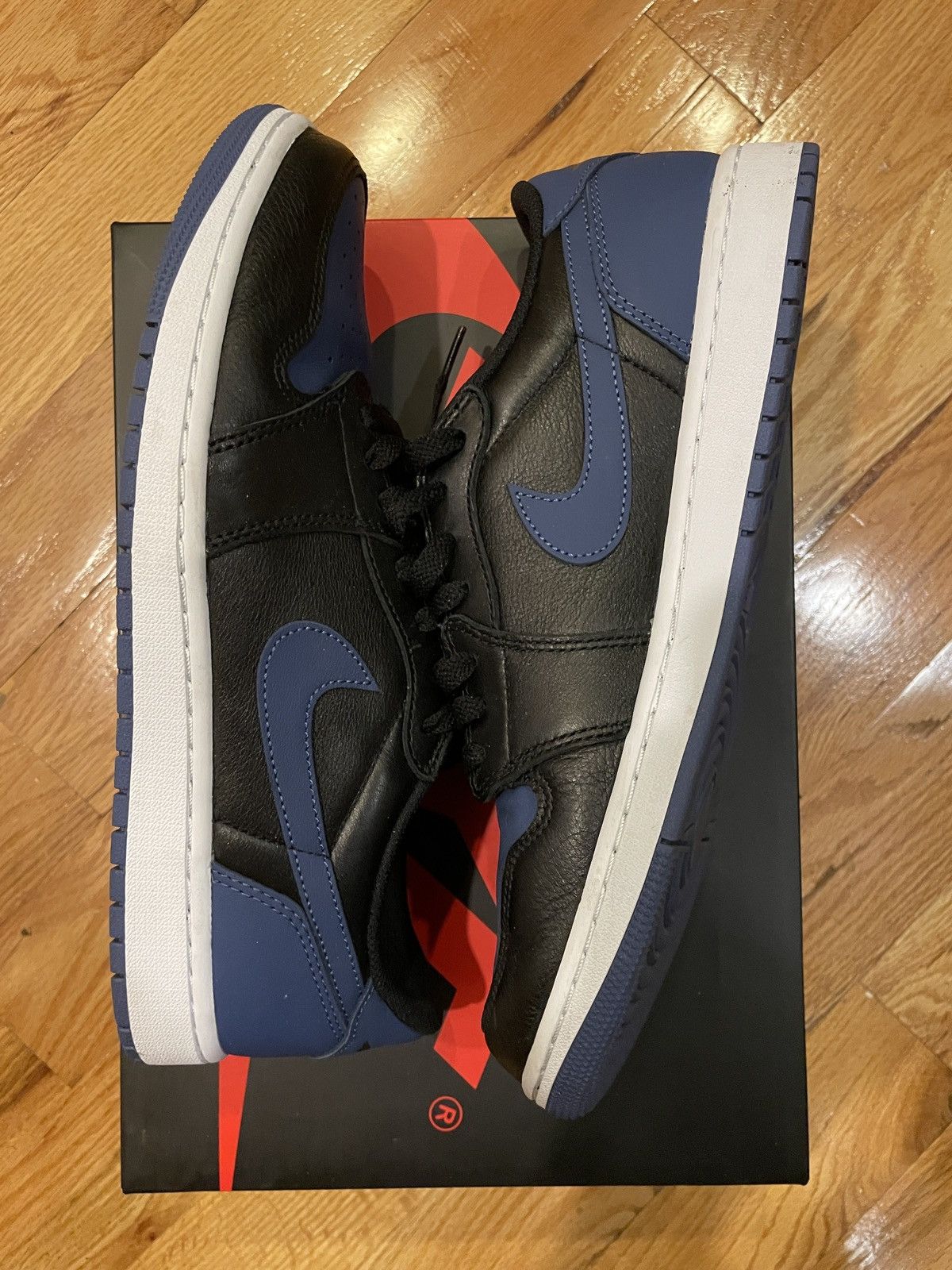 navy blue jordan 1 low