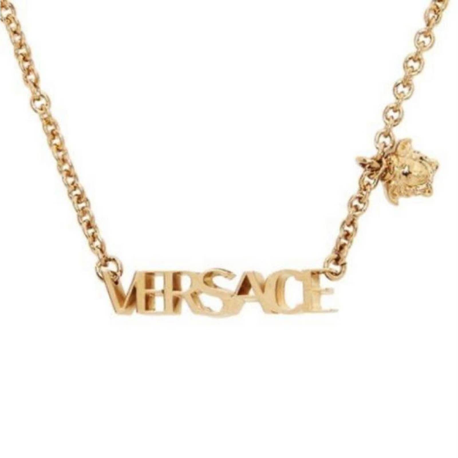 Medusa logo bar gold tone necklace