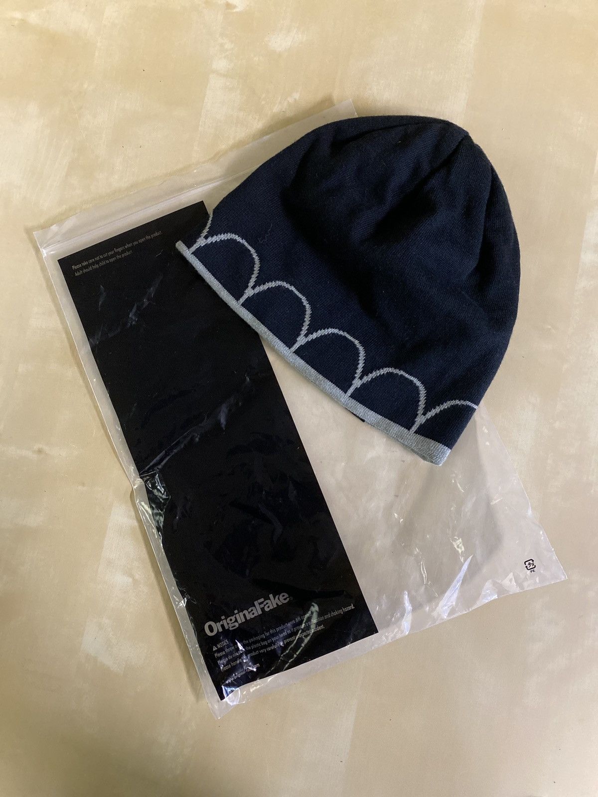 Kaws × Original Fake BRAND NEW ORIGINAL FAKE KAWS REVERSIBLE BEANIE |  Grailed