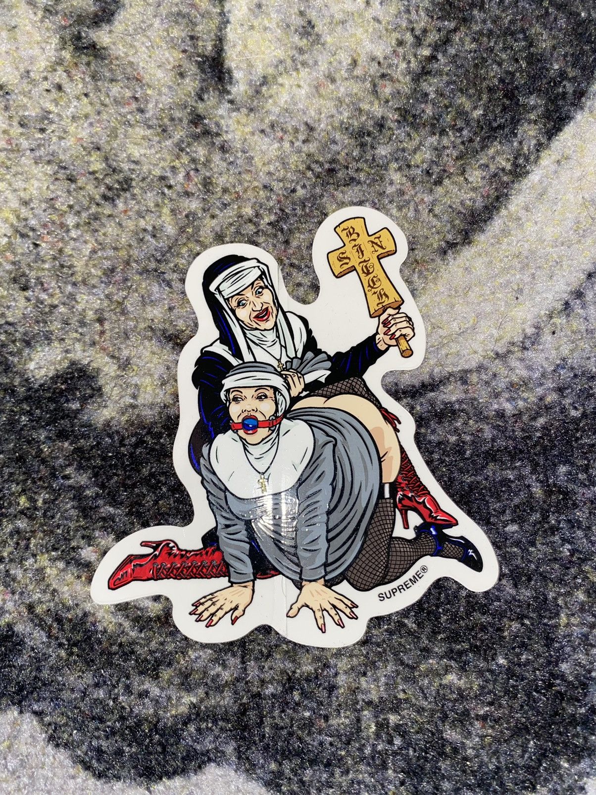 Supreme nun cheap sticker