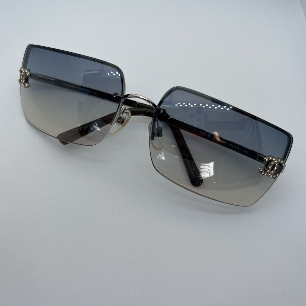 Chanel 4092-B 124/7B blue rimless rhinestone Chanel sunglasses.