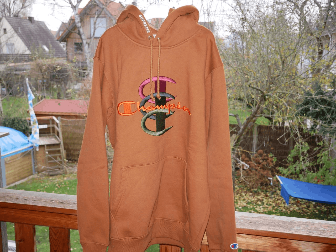 Supreme champion hoodie orange deals