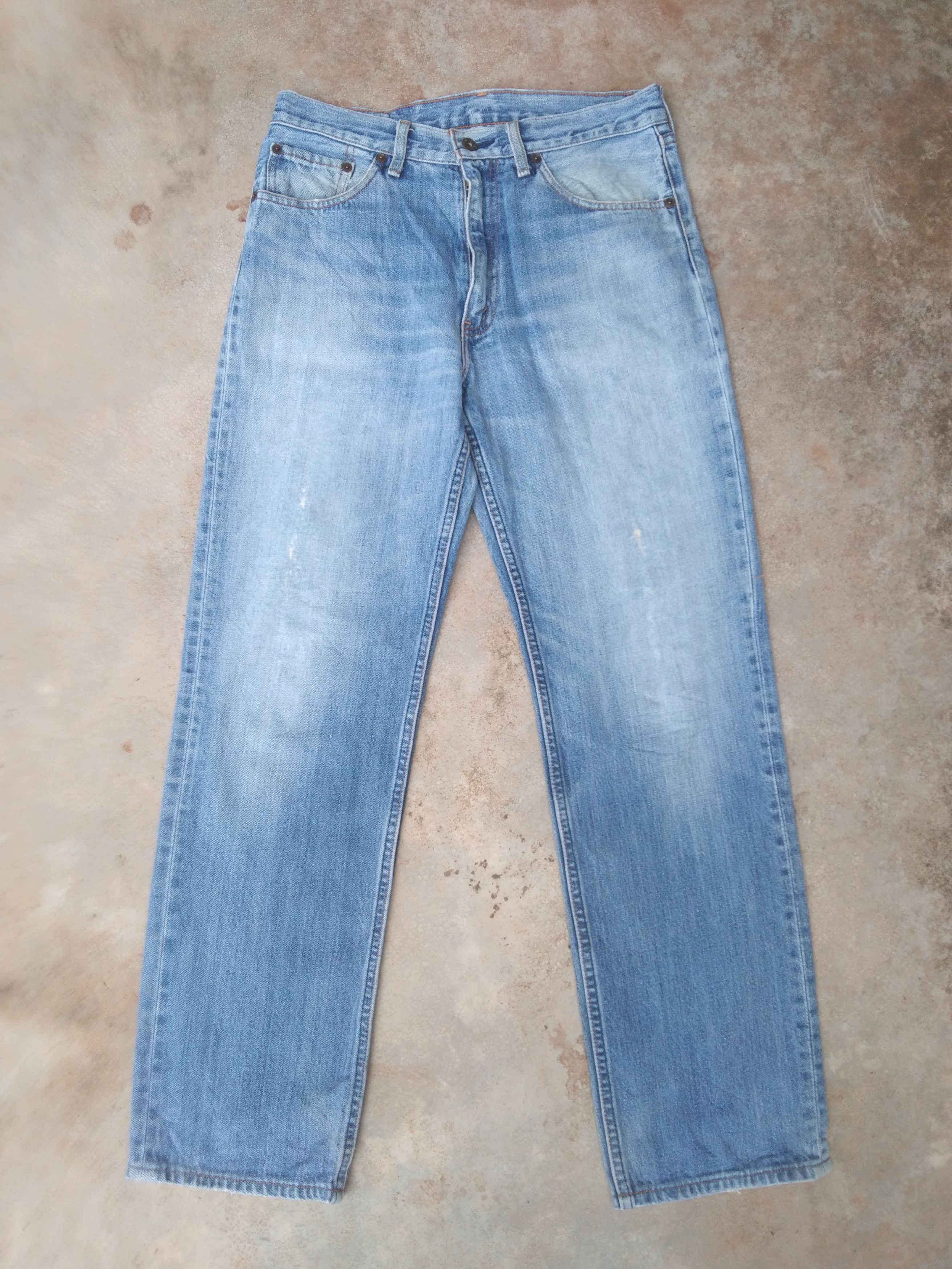 image of Vintage Levi's Jeans 502 Light Wash Distressed Denim 31X30.5, Men's