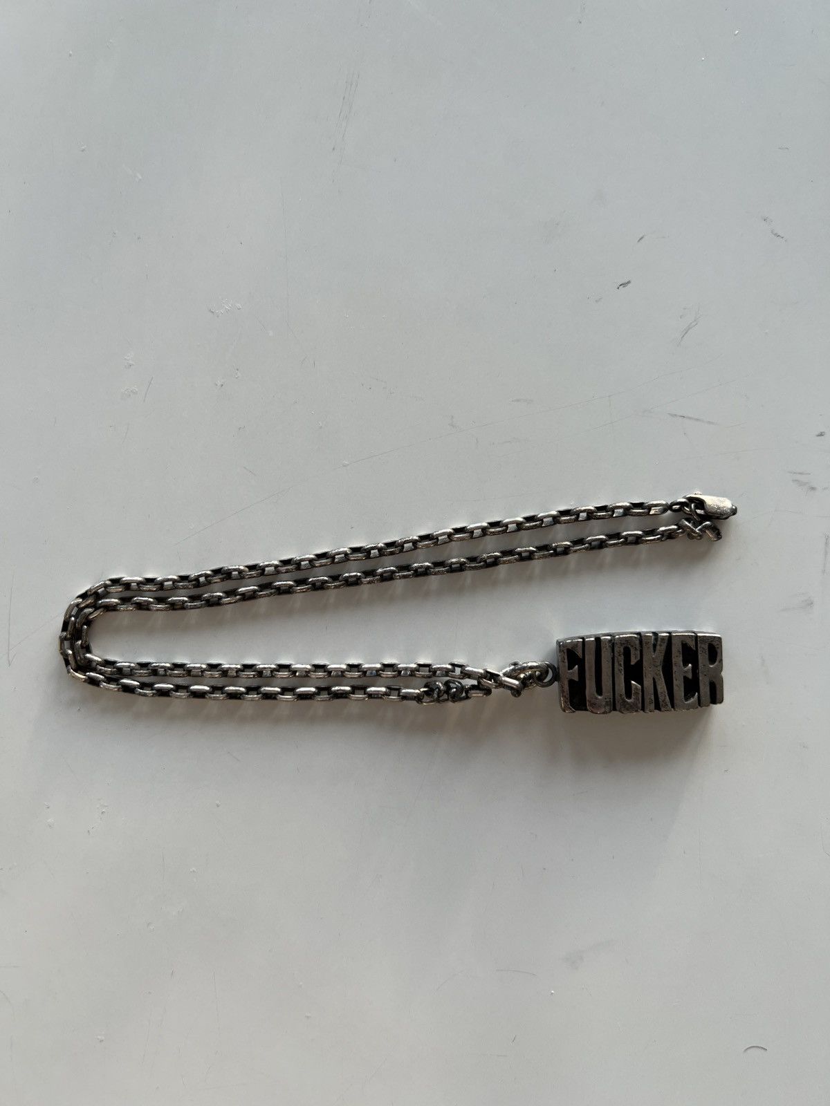 Undercover Undercover x TRASH Fucker Ring | Grailed