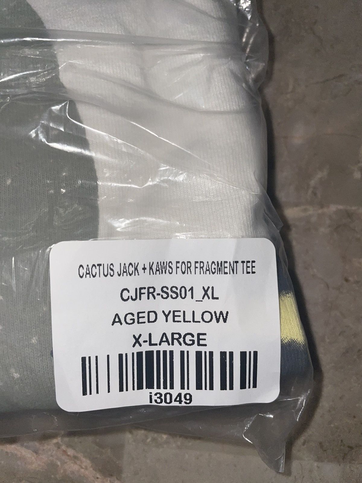 travis scott x kaws t shirt