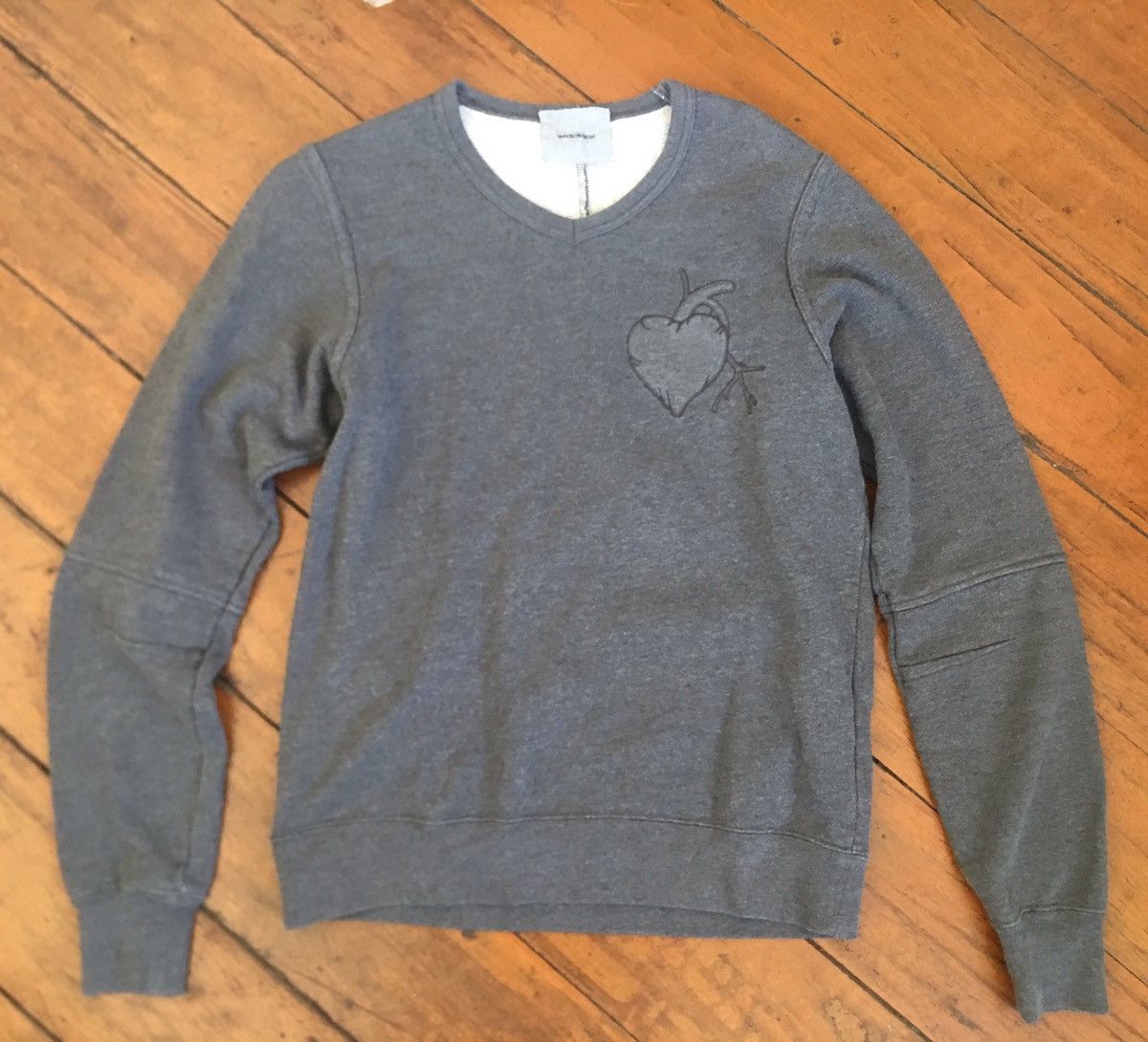 Undercoverism “anatomicouture” heart patch sweater