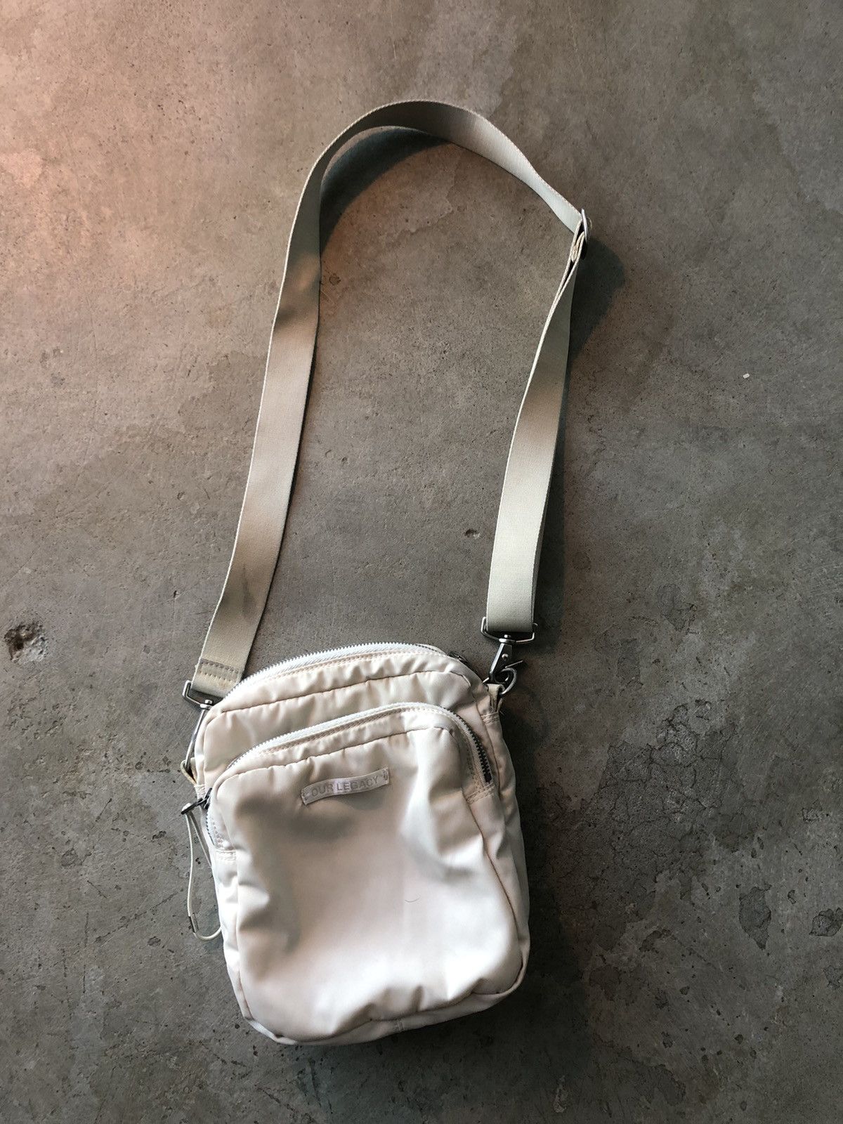 image of Our Legacy Valve Nylon Crossbody Sling Shoulder Bag Off White Nicotine in Cream, Men's