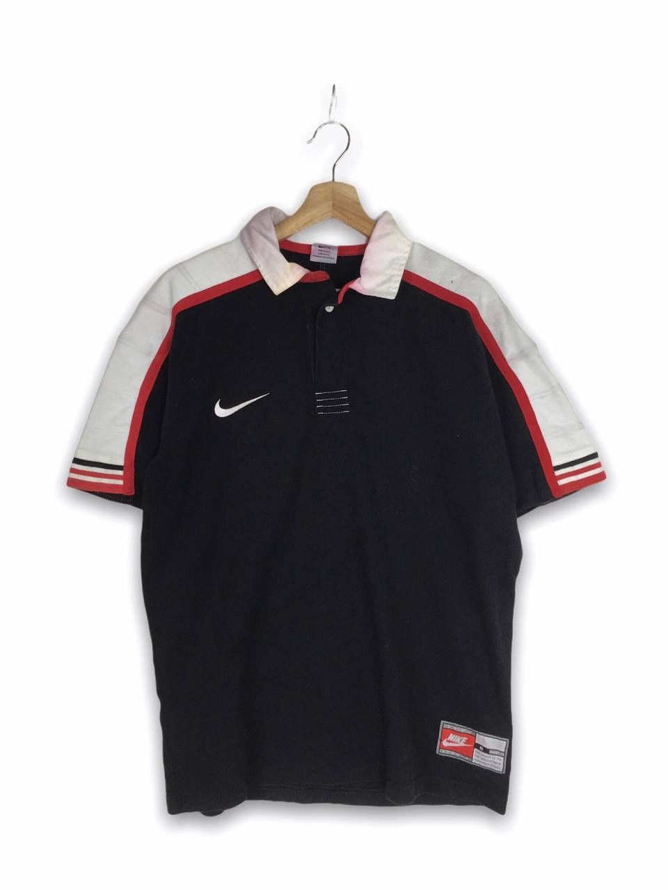 swoosh nike rugby shirt