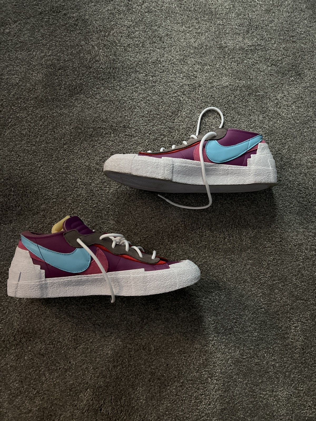 sacai x kaws nike blazer low