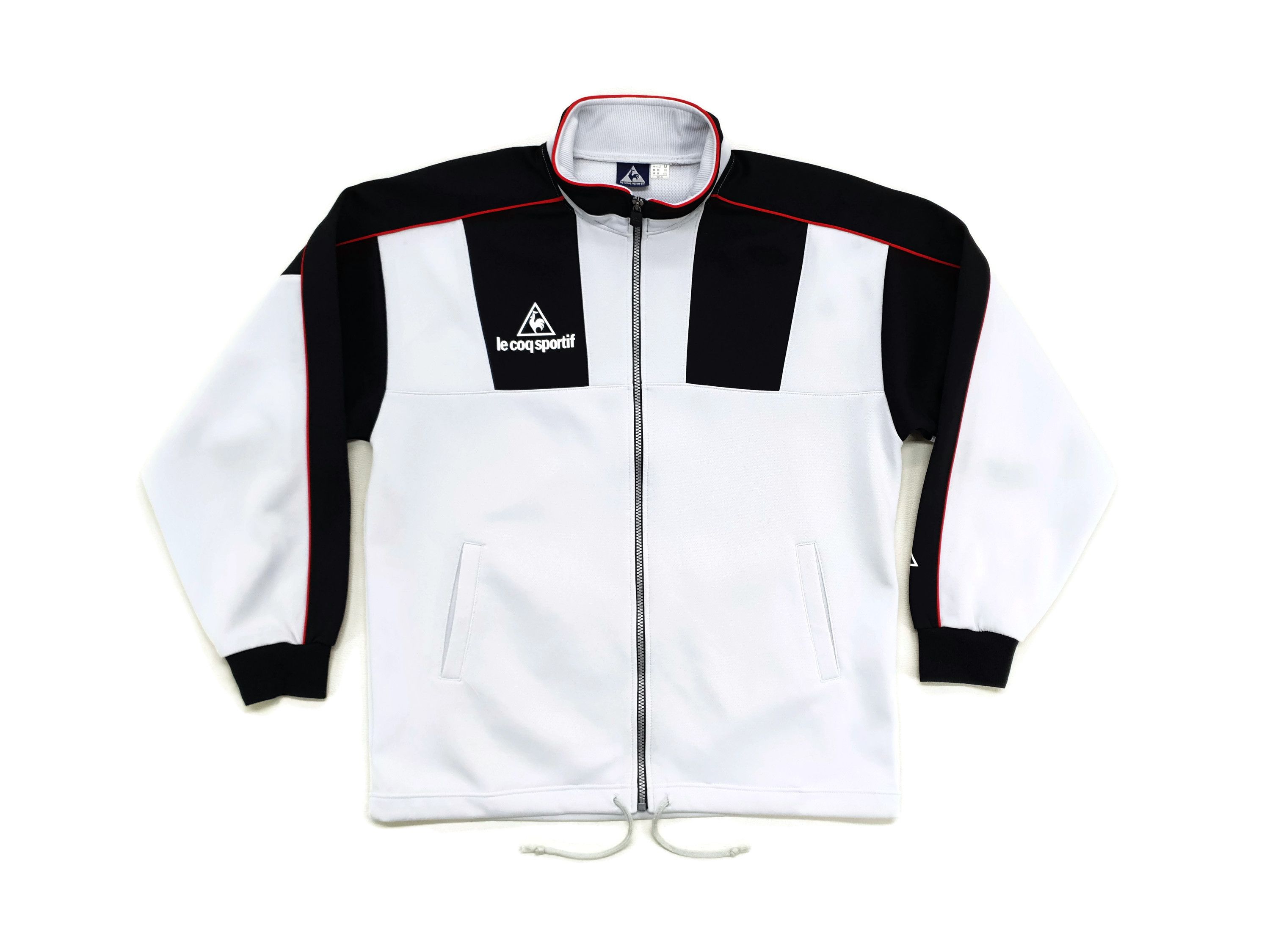 Le Coq Sportif nylon pullover jacket by Is-ness | Grailed