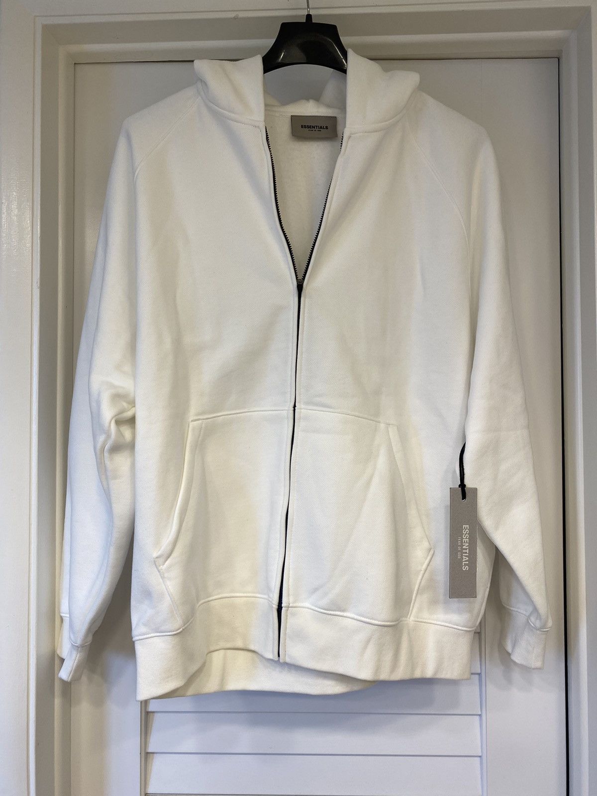Essentials Fear of God white zip up hoodie Medium