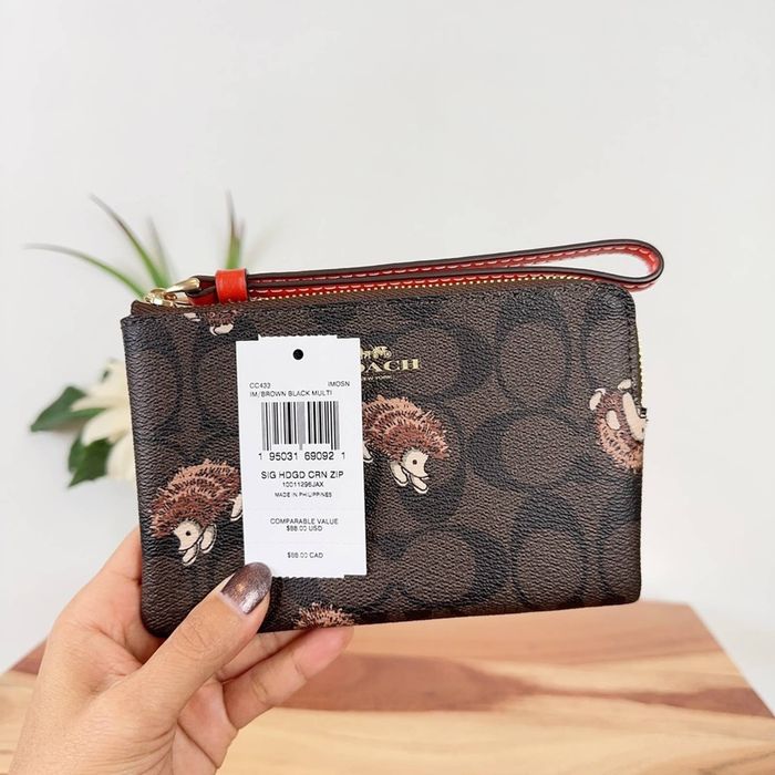 Coach Corner Zip Wristlet In Signature Canvas With Hedgehog Print