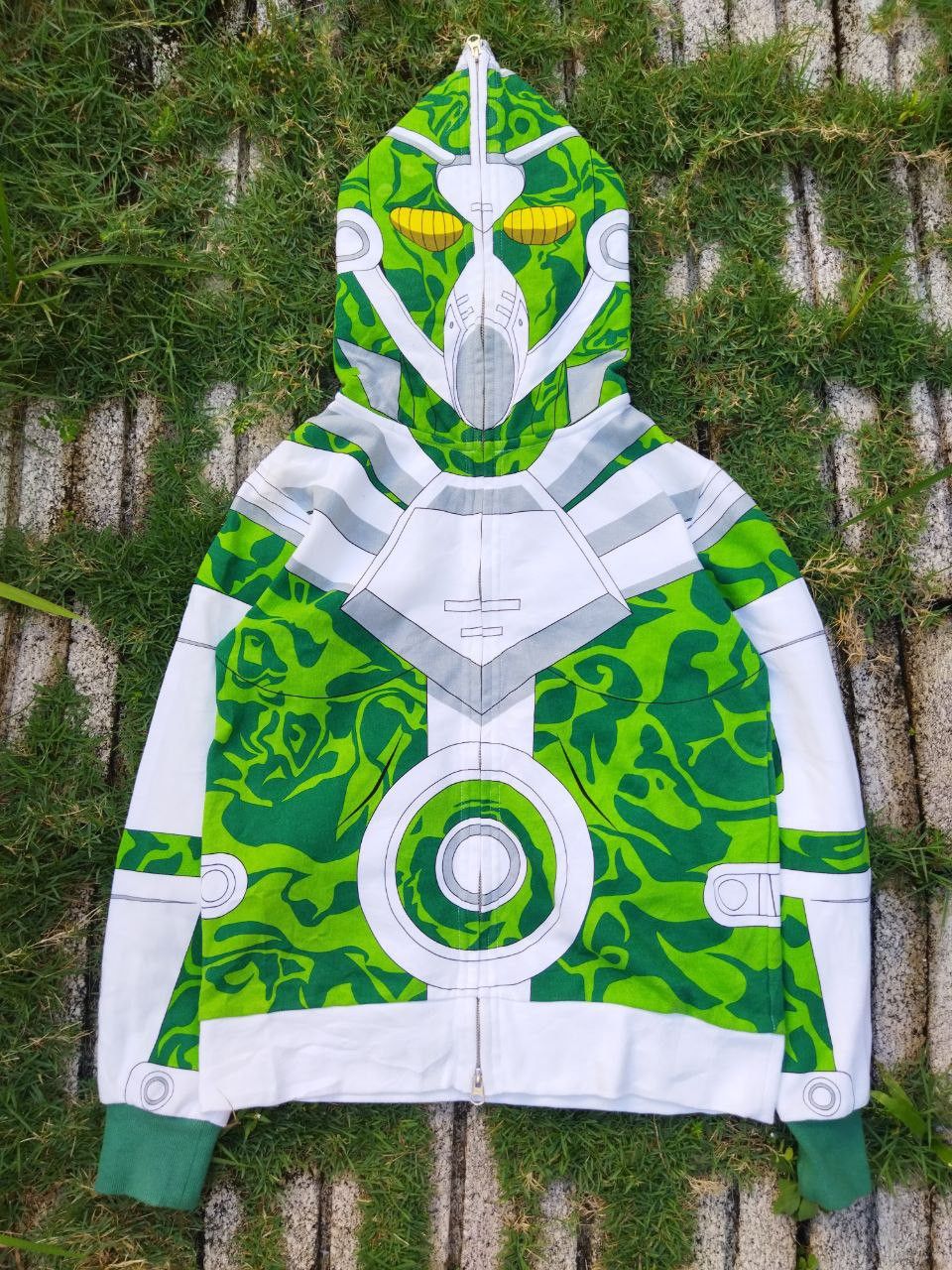 image of Anima x Cartoon Network Vintage Jojo's Bizarre Hierophant Green Full Zip Hoodie in Green White (Siz