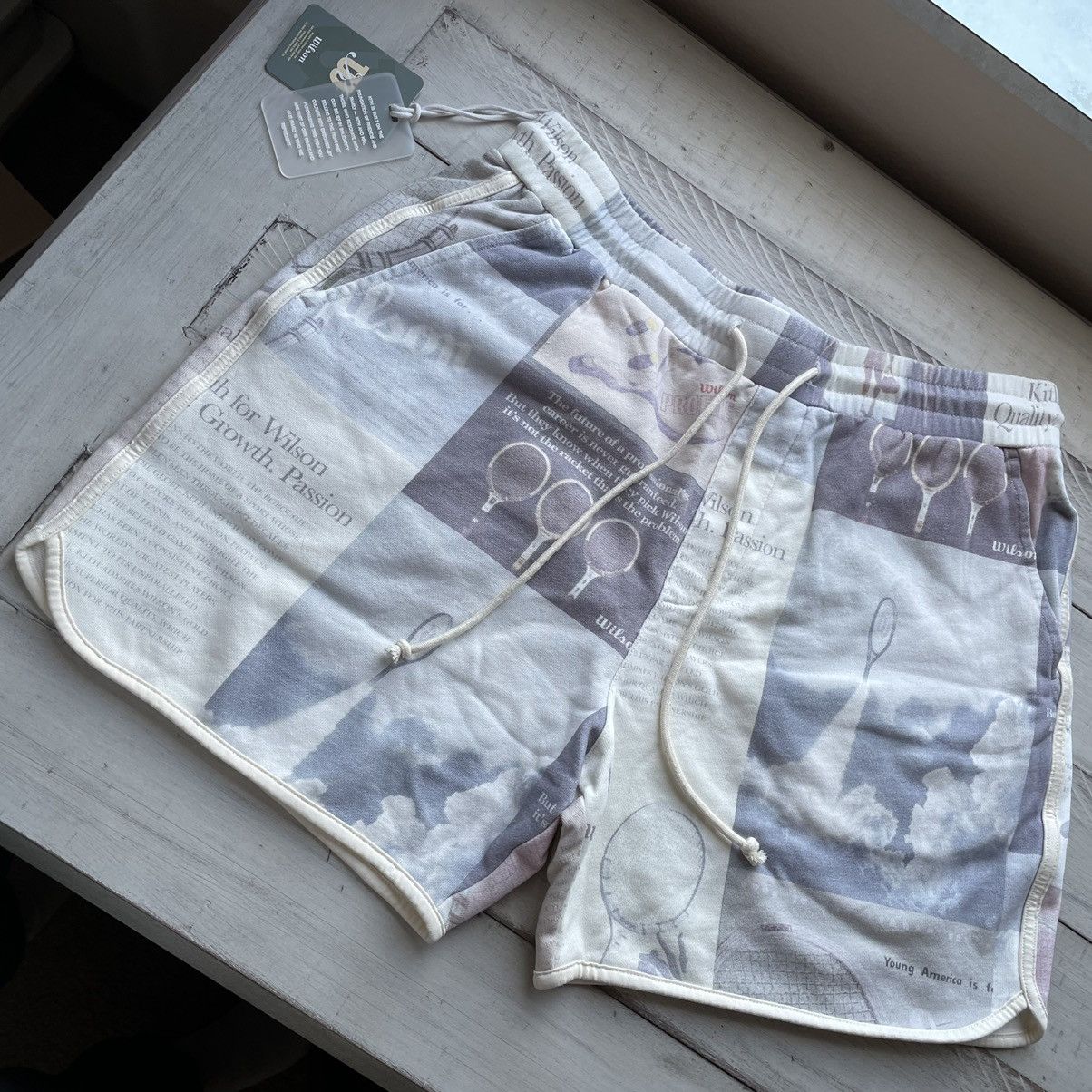 Image of Kith x Ronnie Fieg Multi-Color Poster Print Jordan Tennis Shorts Sweatshorts in Natural (Size 33)