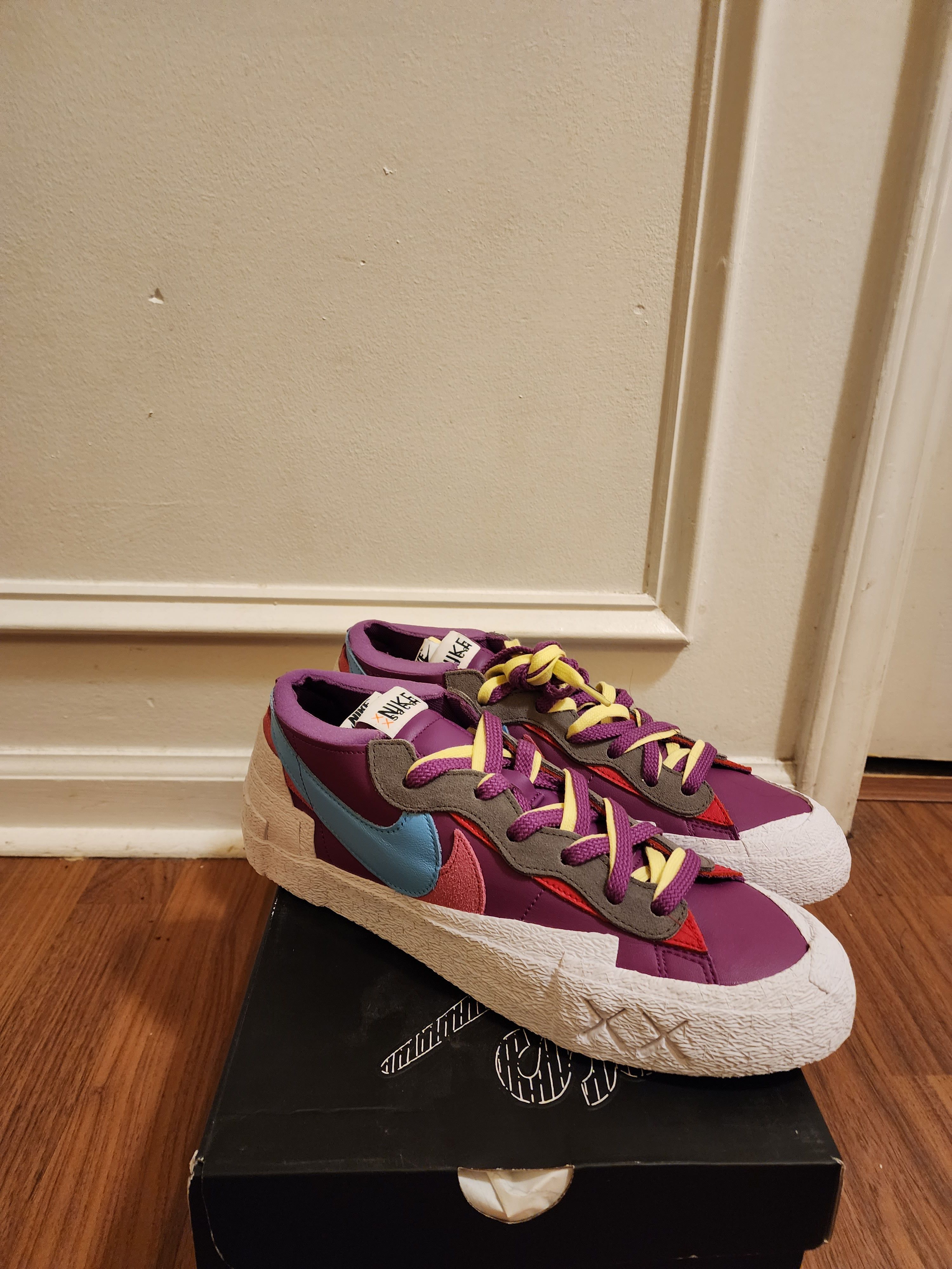 sacai x kaws nike blazers