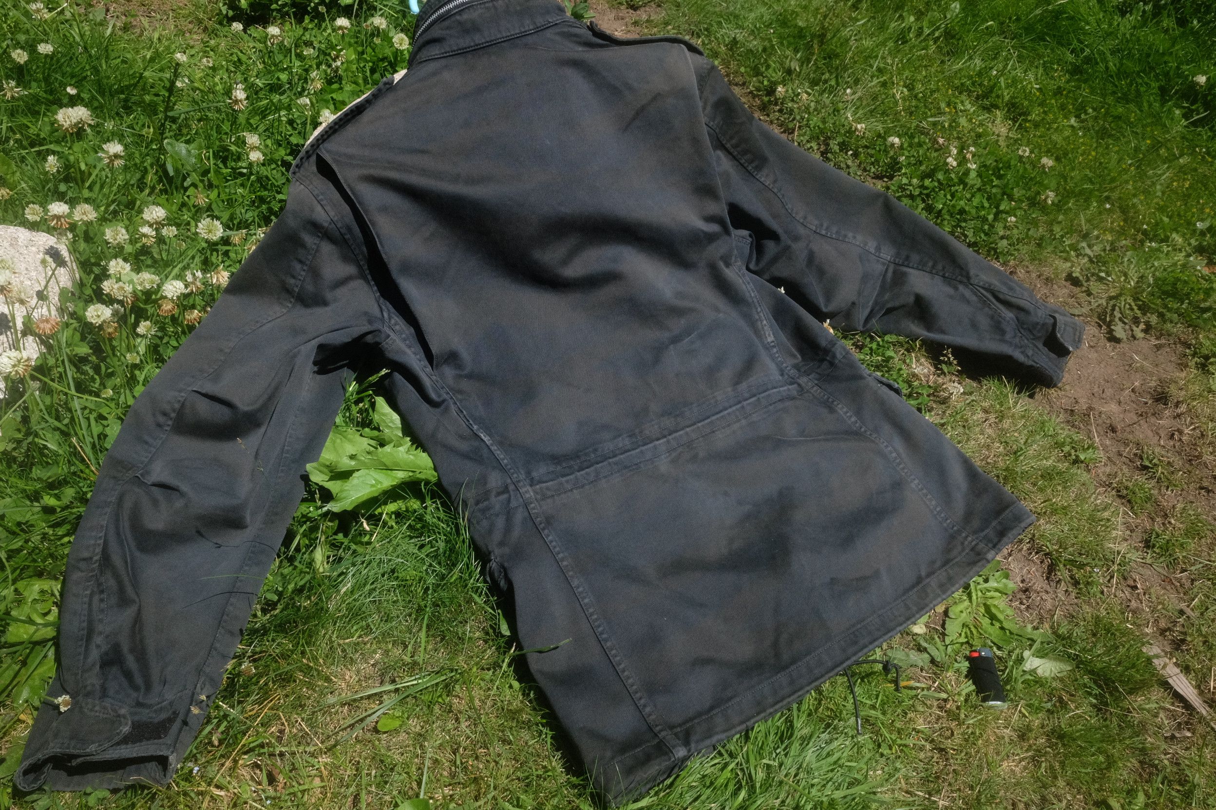 The Real McCoy's Black overdyed tiger stripe M-65 | Grailed